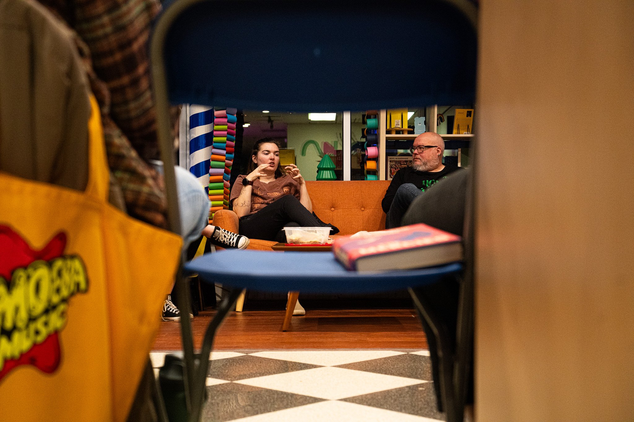 A member connecting the book she read this month to other book she read previously during the November Book Club meeting on November 20th, 2025 in Lansing, Mich.
