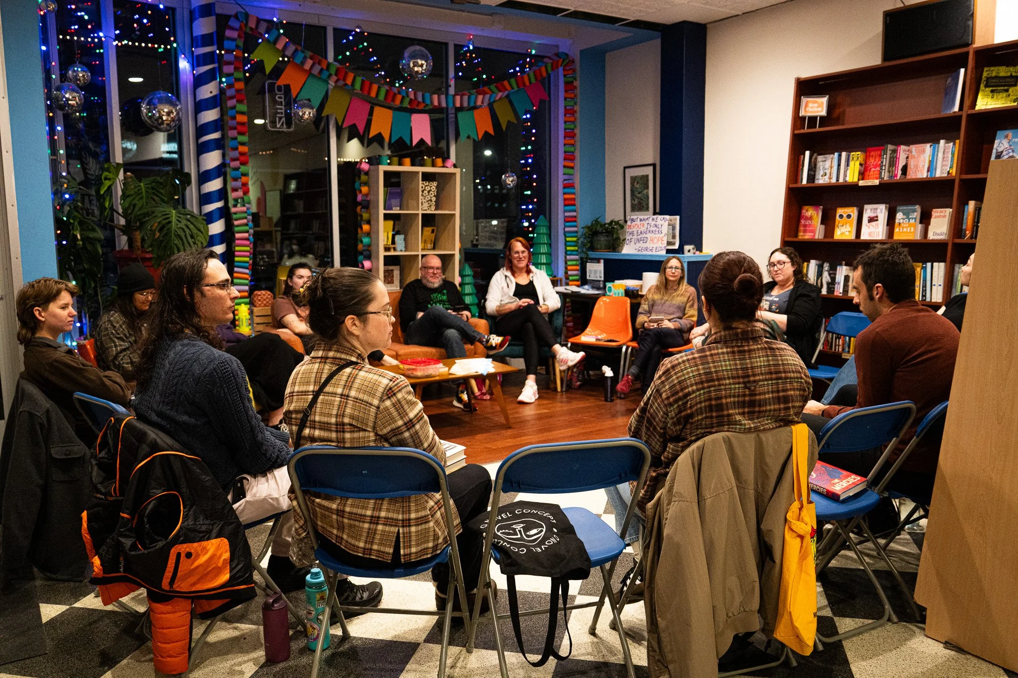 Everyone fully engaged and listening to their fellow member discuss how they connected to their book during the November Book Club meeting on November 20th, 2025 in Lansing, Mich.