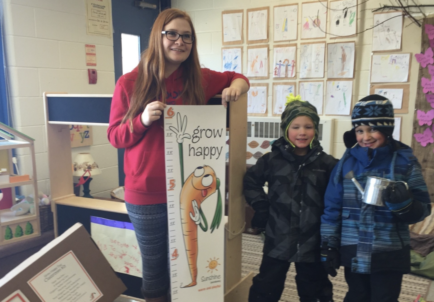 Teacher with growth chart