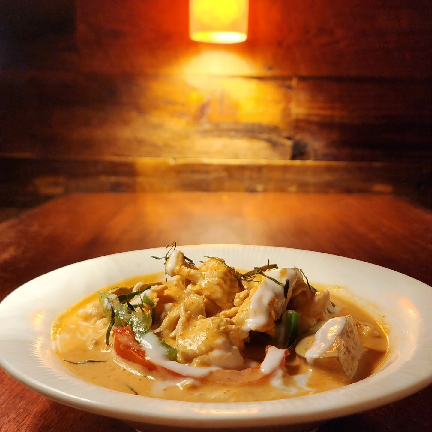 ✨️Parang Curry✨️ 

A true Thai staple dish. With traditional panang chili paste, tender sweetness of coconut milk, juicy eggplant, fresh bell pepper, lime leaf for added taste, served with a jasmine rice ball, you can never go wrong - and your tasteb