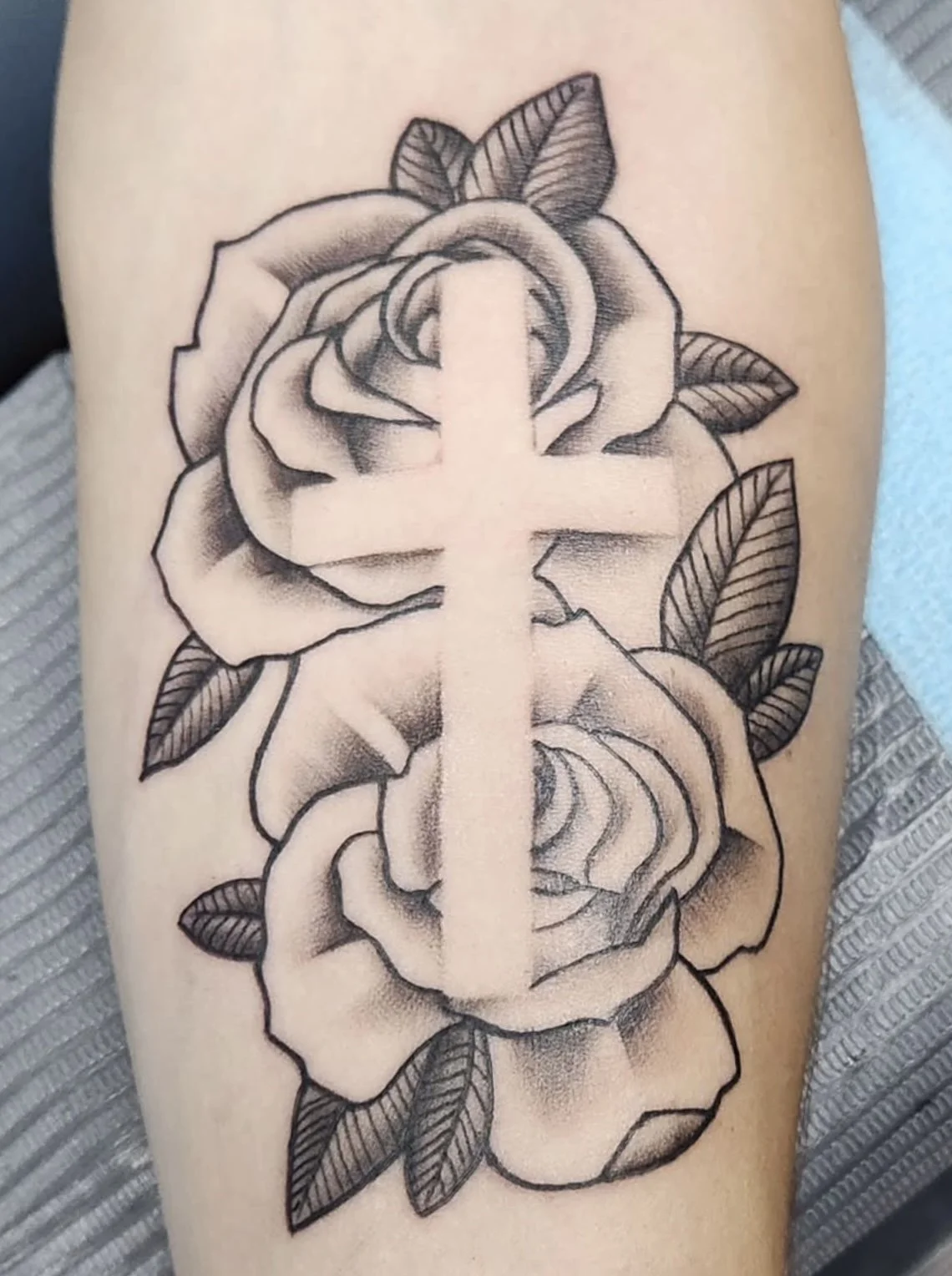 Roses and Negative Shaded Cross Tattoo