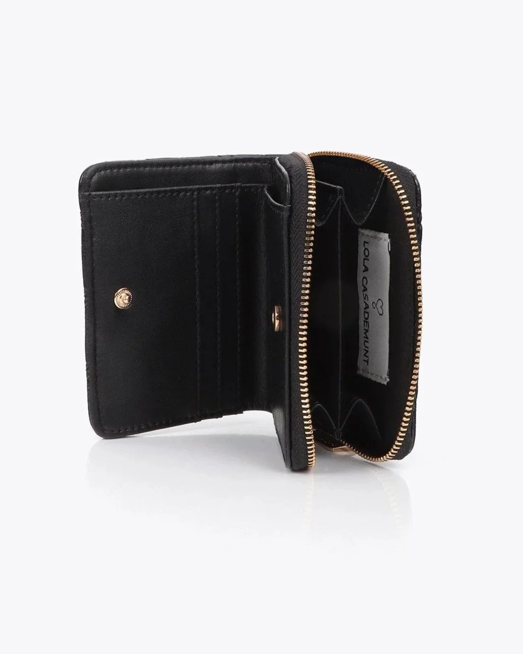 monedero-acolchado-con-doble-pespunte-y-tirador-tubular+%282%29.jpg