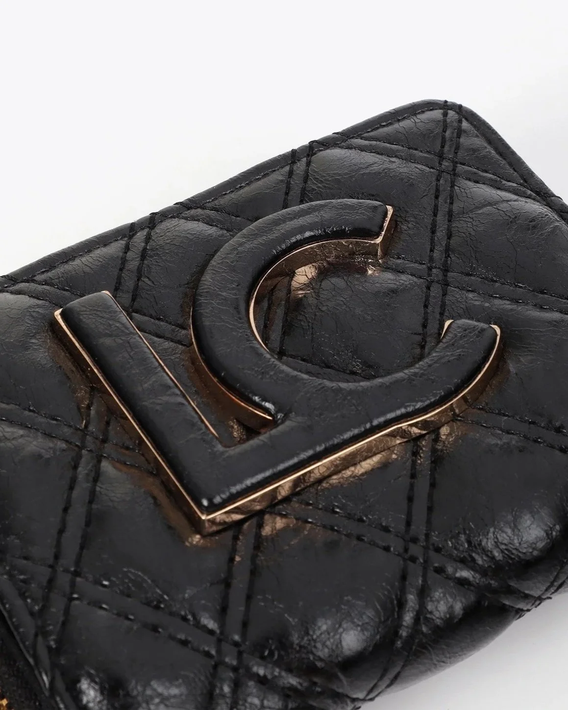 monedero-acolchado-con-doble-pespunte-y-tirador-tubular+%283%29.jpg