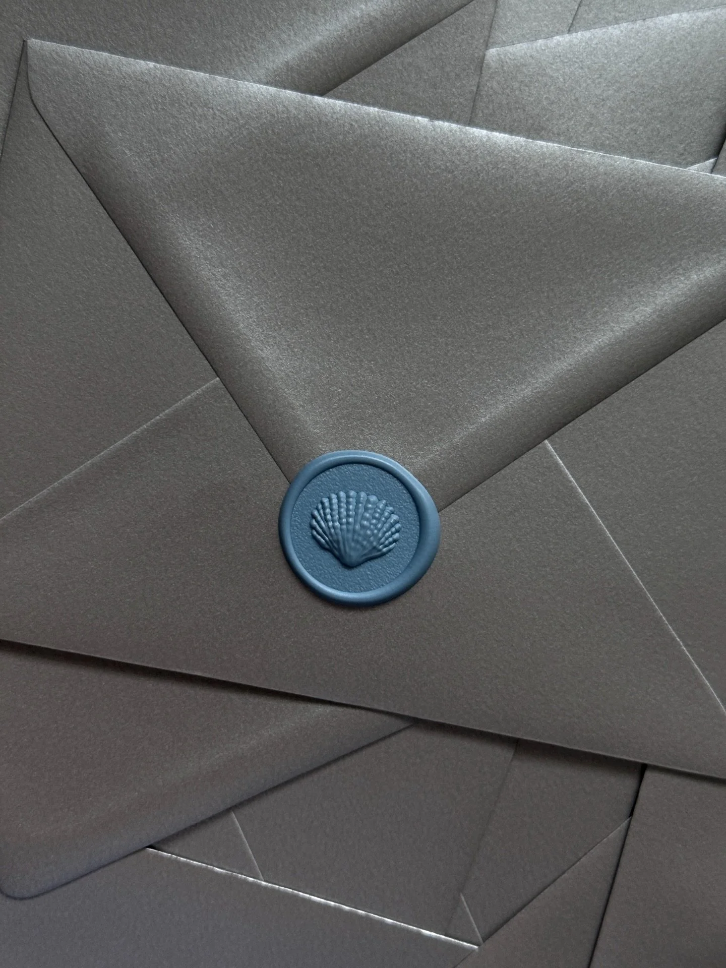 Salty air, silver tones and paper you want to touch 🐚
A save the date for a destination beach wedding in Italy.

MAKTUBI is a wedding stationery studio designing fashion-forward, editorial invitations and paper goods for modern celebrations worldwid