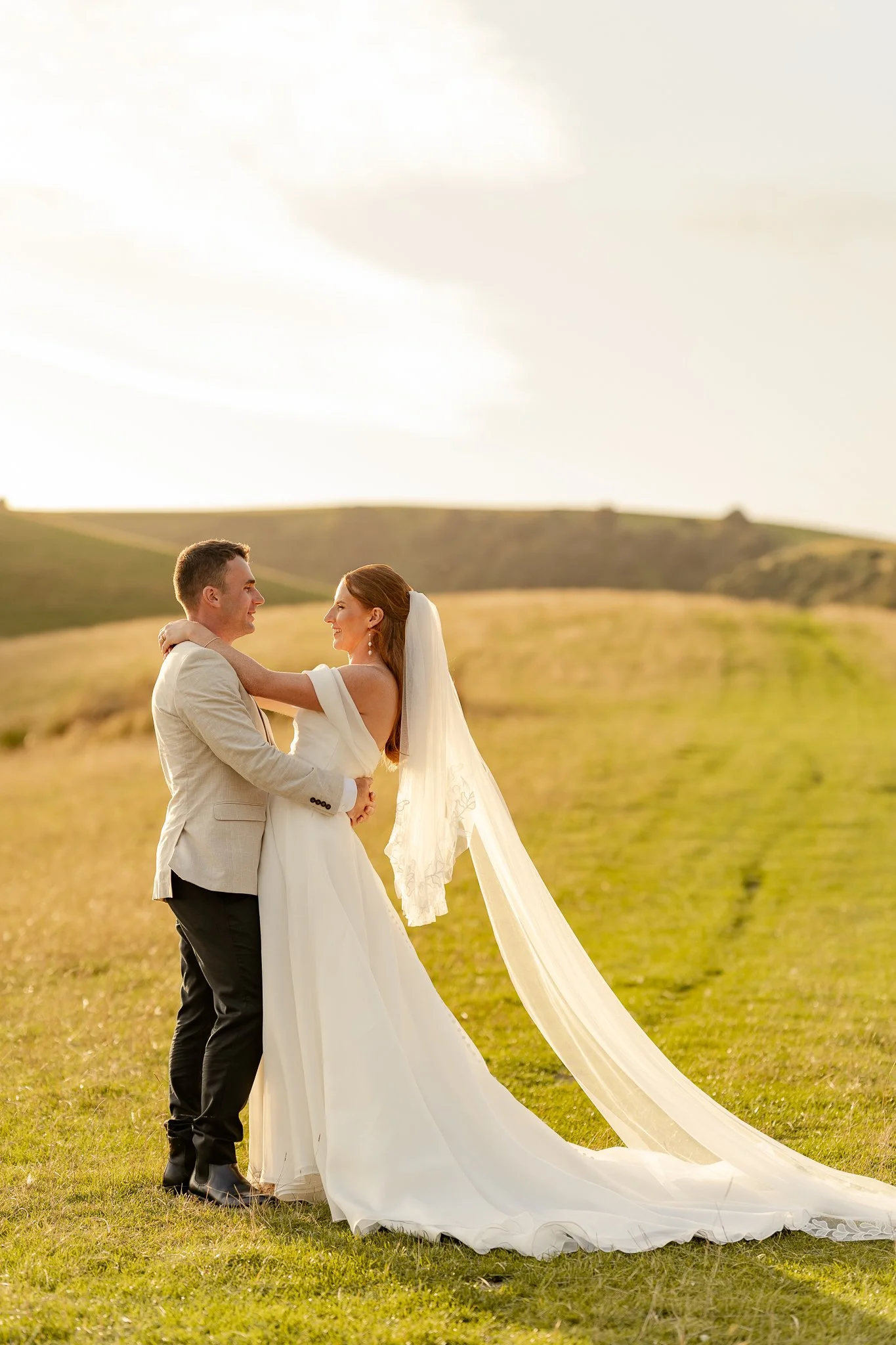 Bride and groom at sunset