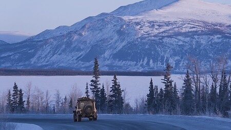 Magical morning drive to Alaska ❄️🩵 @defender.x
 #landrover #defender #defender110 #landroverlife #adventure #expedition #overland #defenderlove #canada #alaska #yukon #roadtrip #landscape
