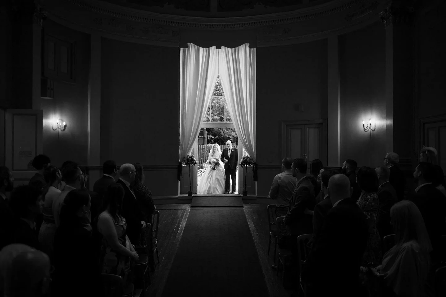 A single frame, a whole story&hellip;her entrance captured in perfect balance.
.
#ajtimages
#awardwinningphotographer 
#alternativewedding
#themedwedding
#unconventionalwedding
#alternativewedding 
#alternativeweddingphotos 
#alternativeweddings 
#di