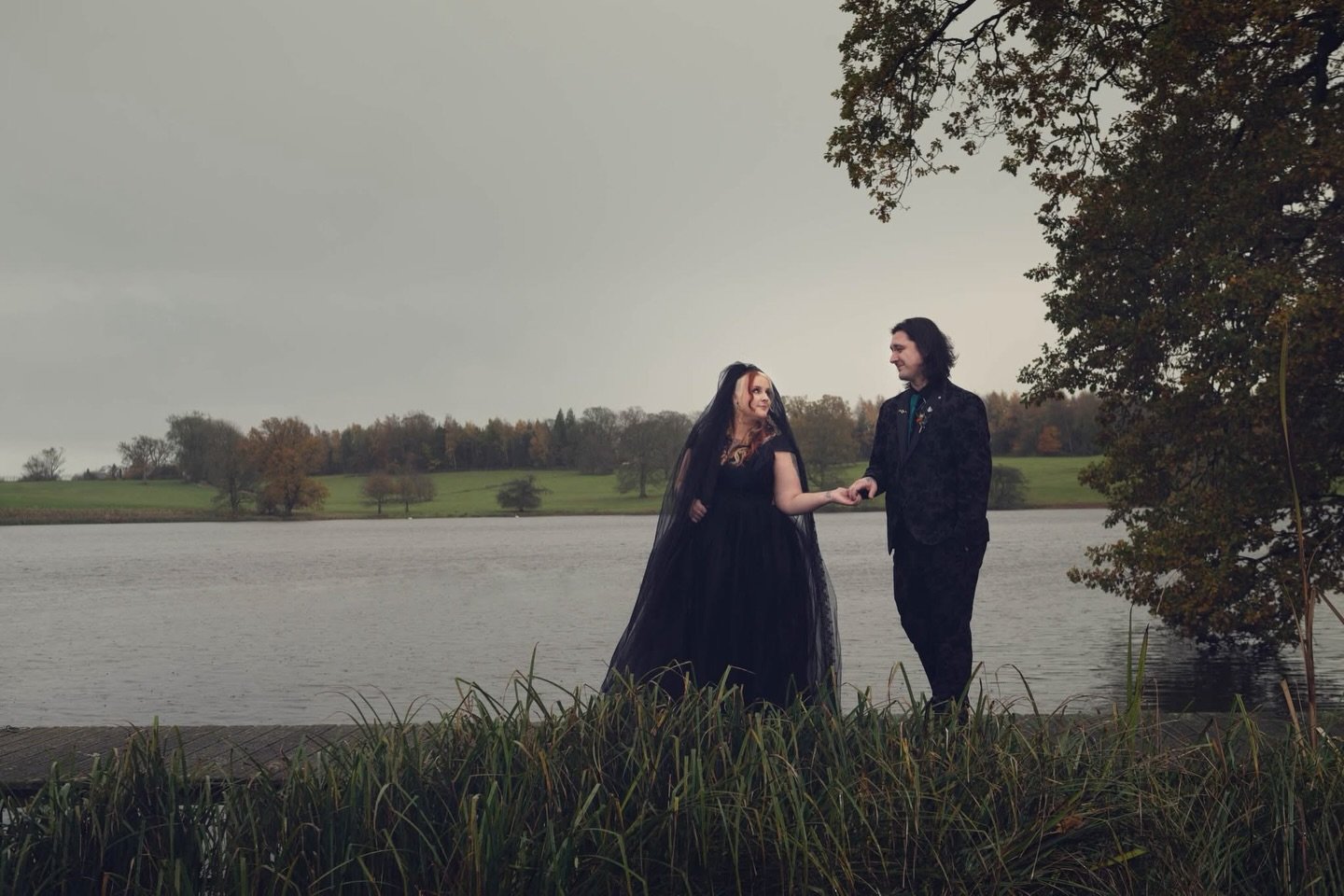 On a quiet lakeside, beneath autumn skies, these two wrote their own kind of wedding story moody, magical, and completely theirs 🖤

#ajtimages #alternativeweddingphotographer #conistonhotelweddingphotographer #conistonhotelweddingphotography