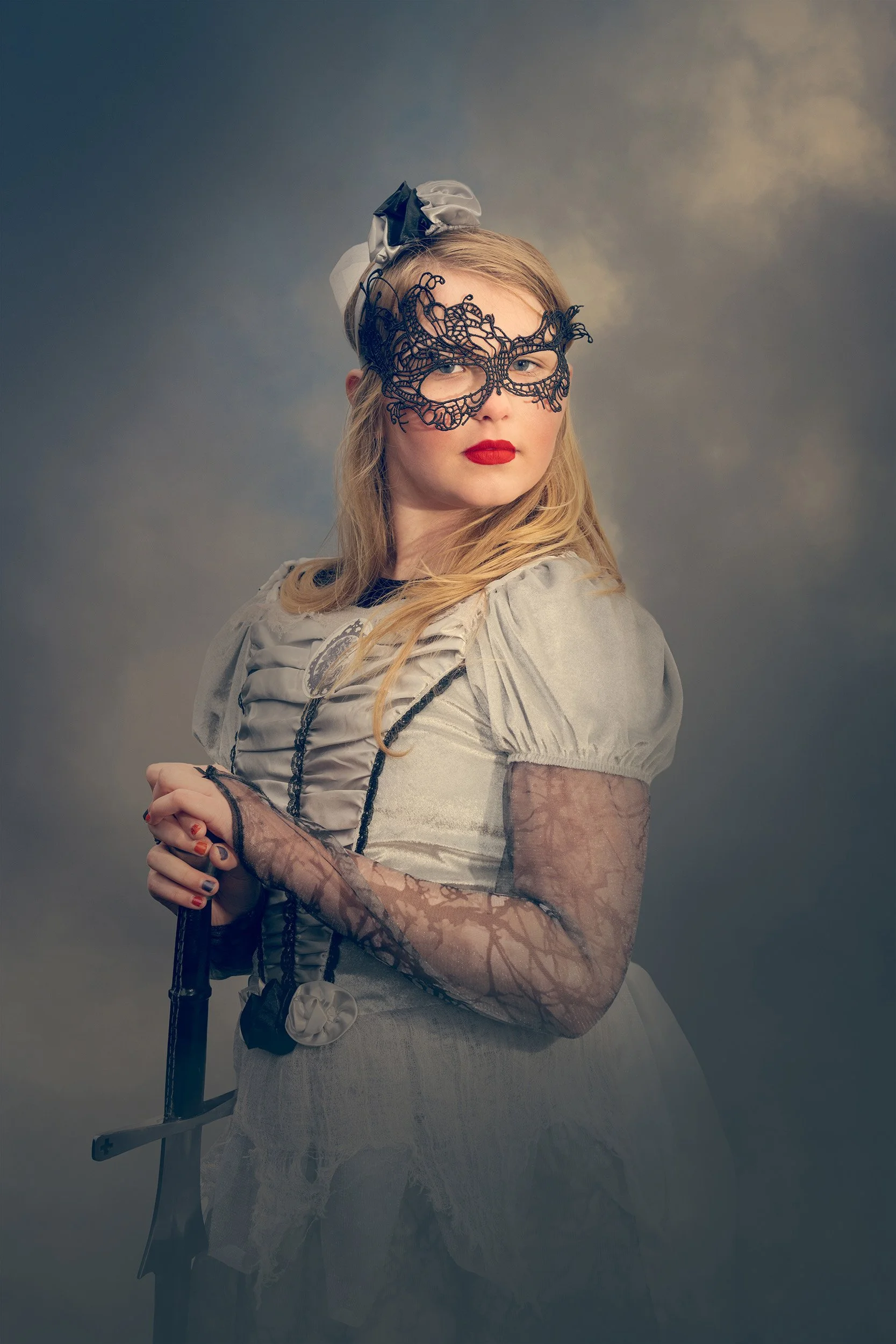 girl in mask with sword ajtimages 