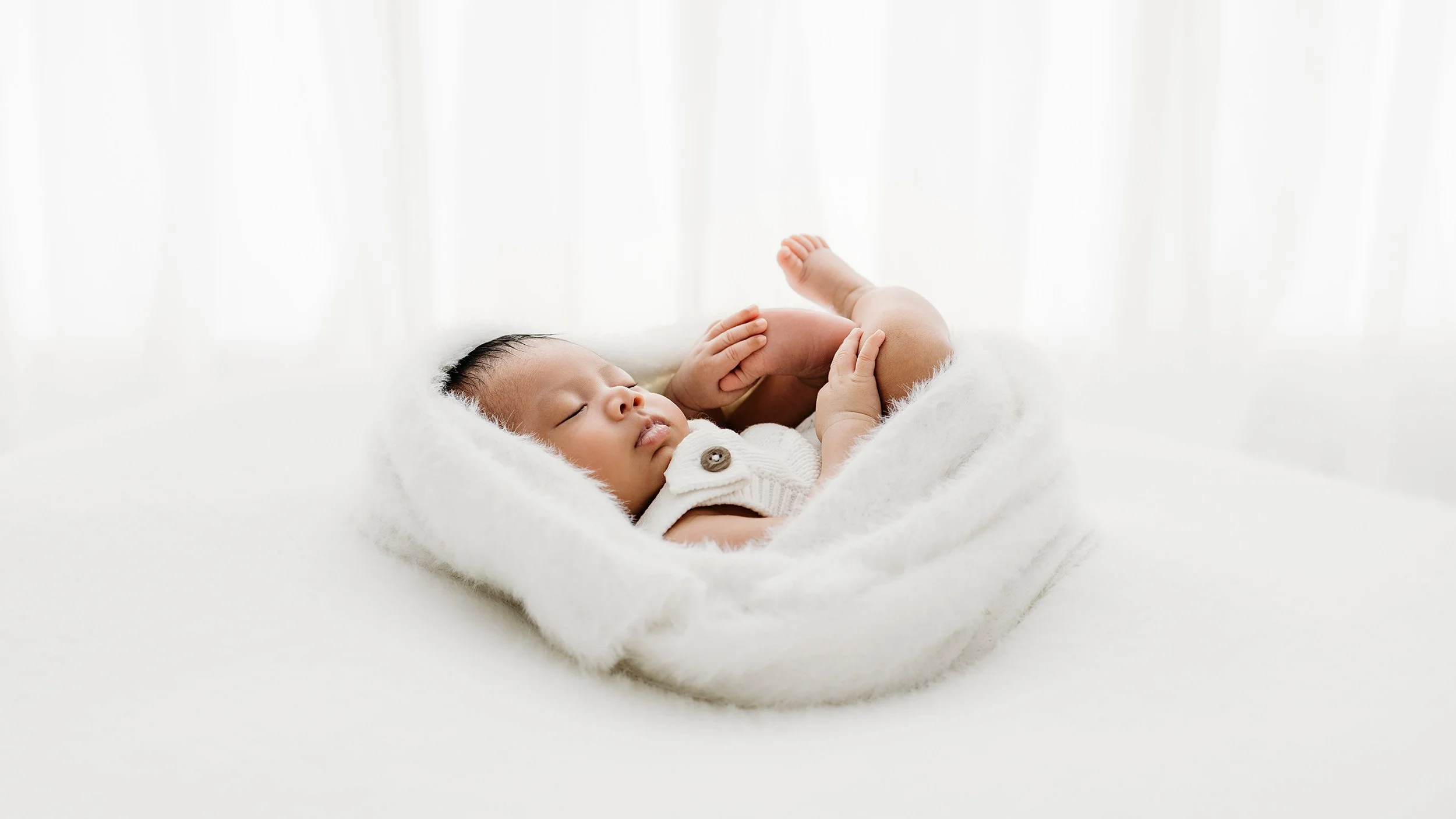 Timeless newborn baby portrait photographed in soft neutral tones at a Swan Valley studio in Perth.