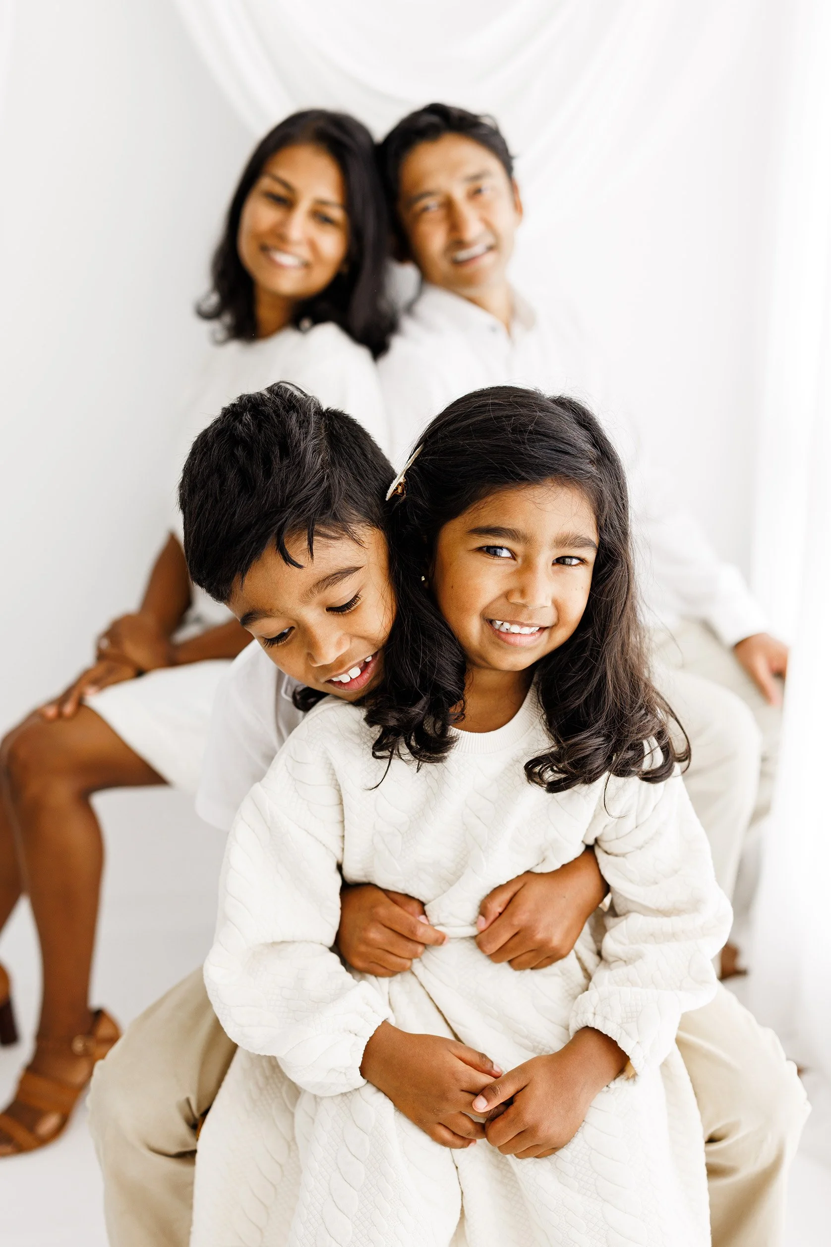 Family photographed together during a relaxed family photography session in Perth