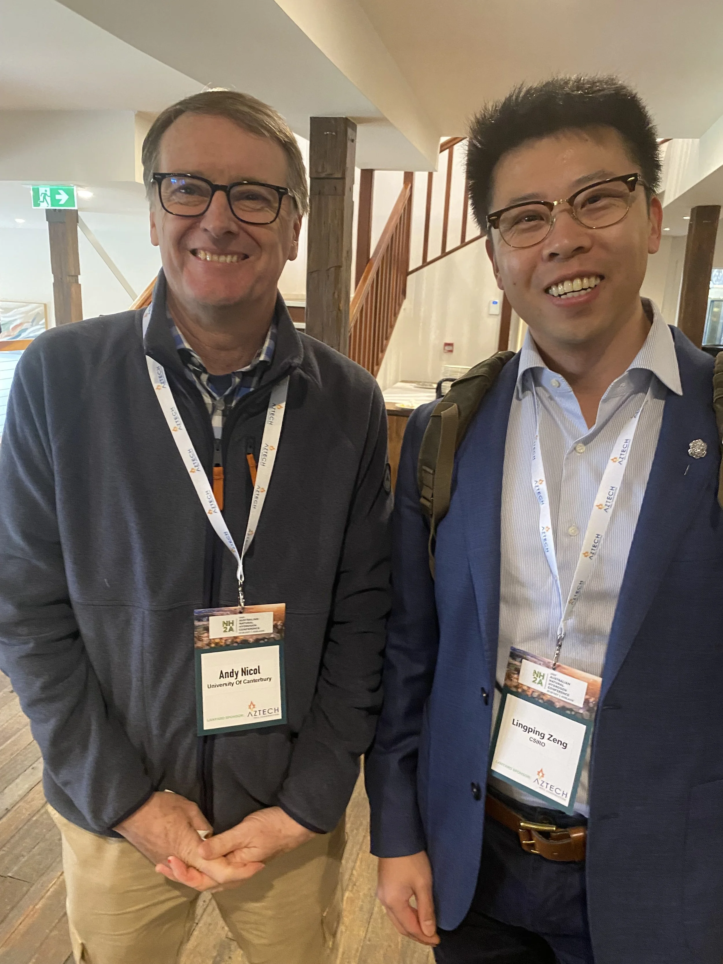 Andy Nicol (University of Canterbury) and Lingping Zeng (CSIRO) chat during lunch.