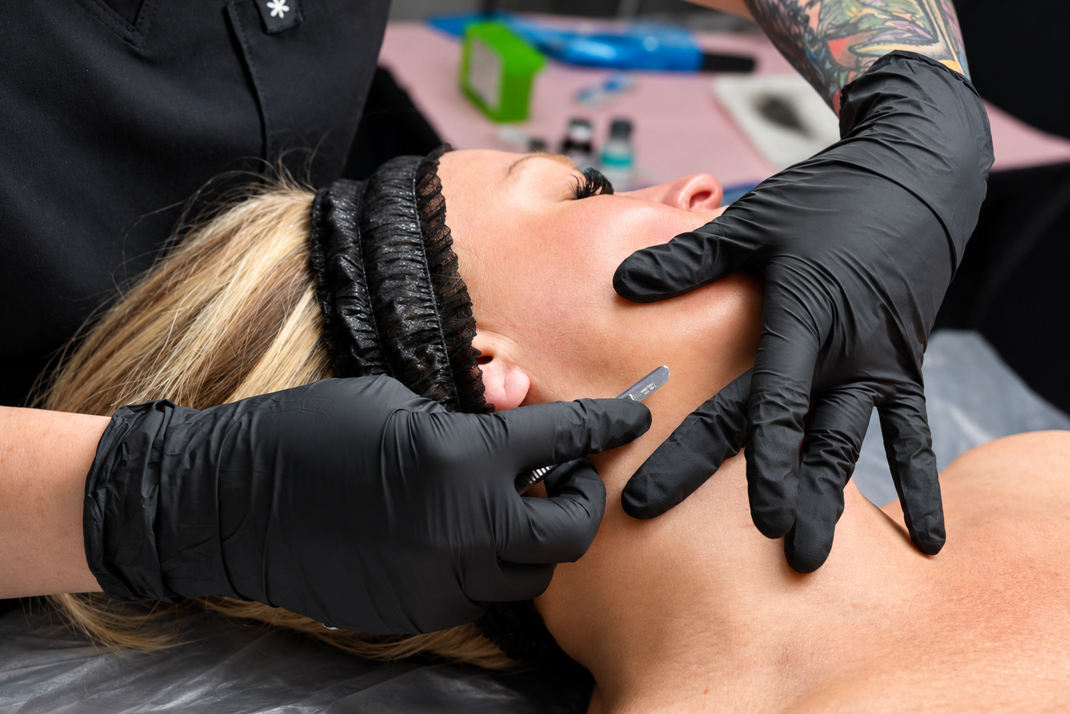 client getting a professional dermaplaning done with a medical grade blade