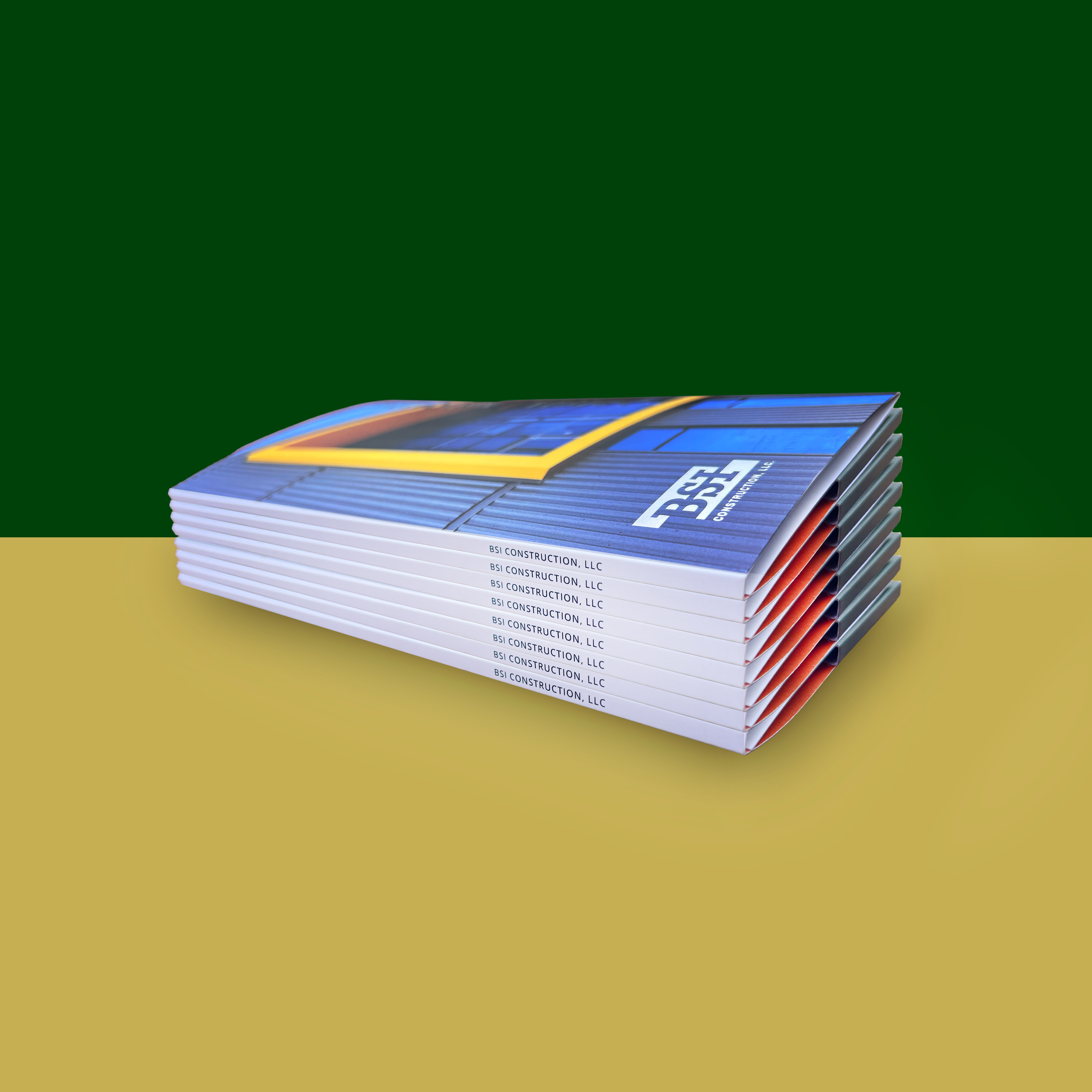 An image of 8 BSI Construction Brochures stacked on top of each other