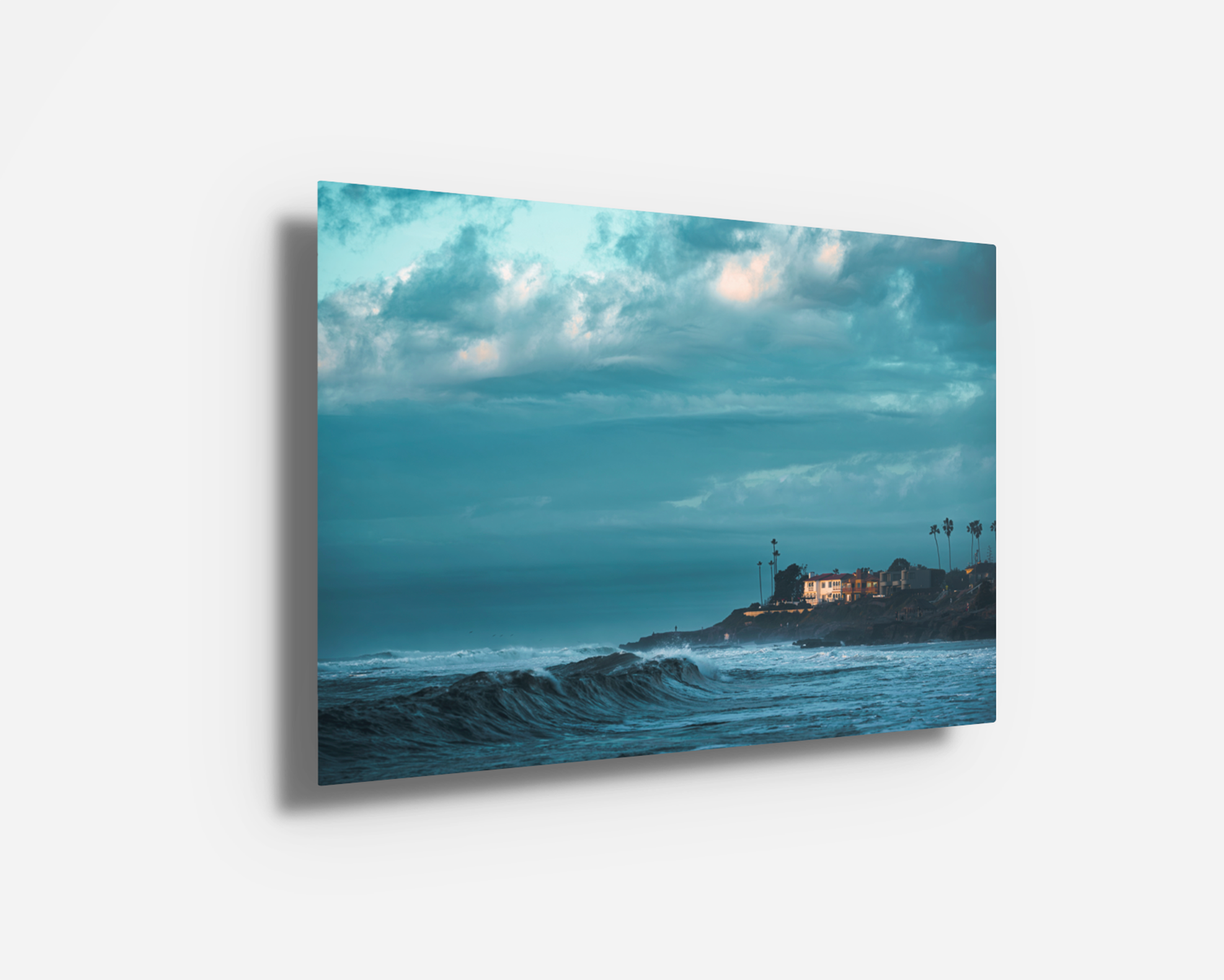 Modern metal print of La Jolla coastline under a turbulent ocean sky.