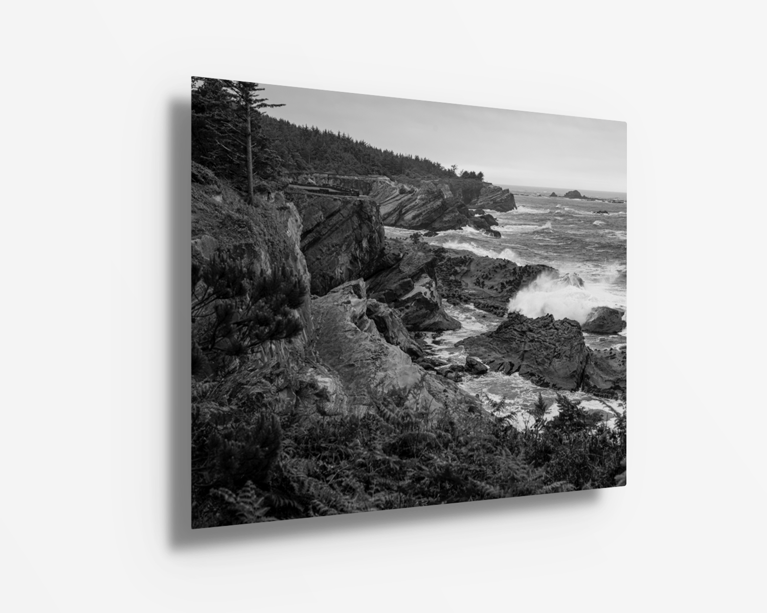 Metal print featuring bold contrast of sea spray, jagged cliffs, and Oregon’s coastal drama in monochrome.