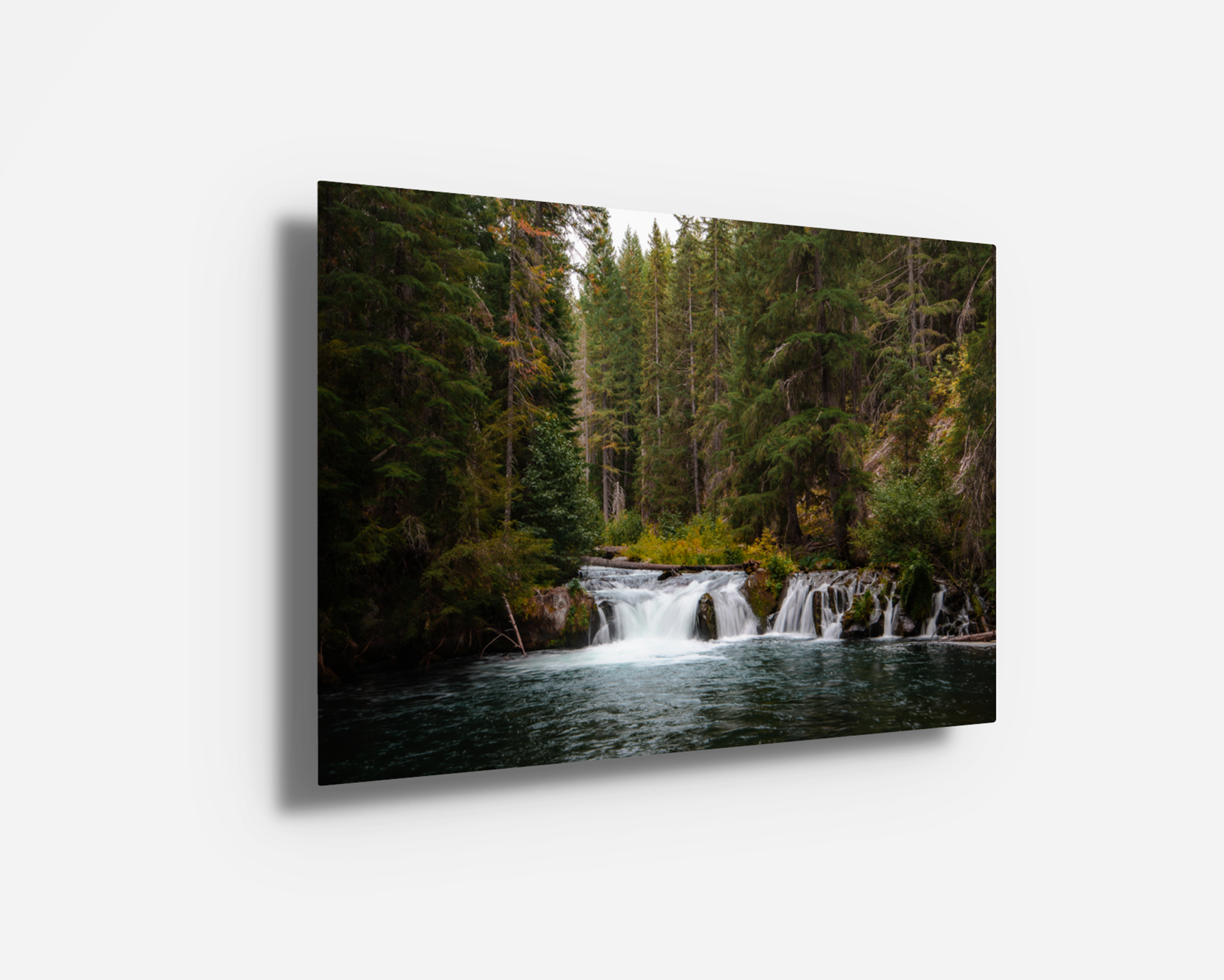 Modern metal print of a North Umpqua River waterfall photograph. Sleek, vibrant wall art showcasing the rich green forest and flowing water in Oregon