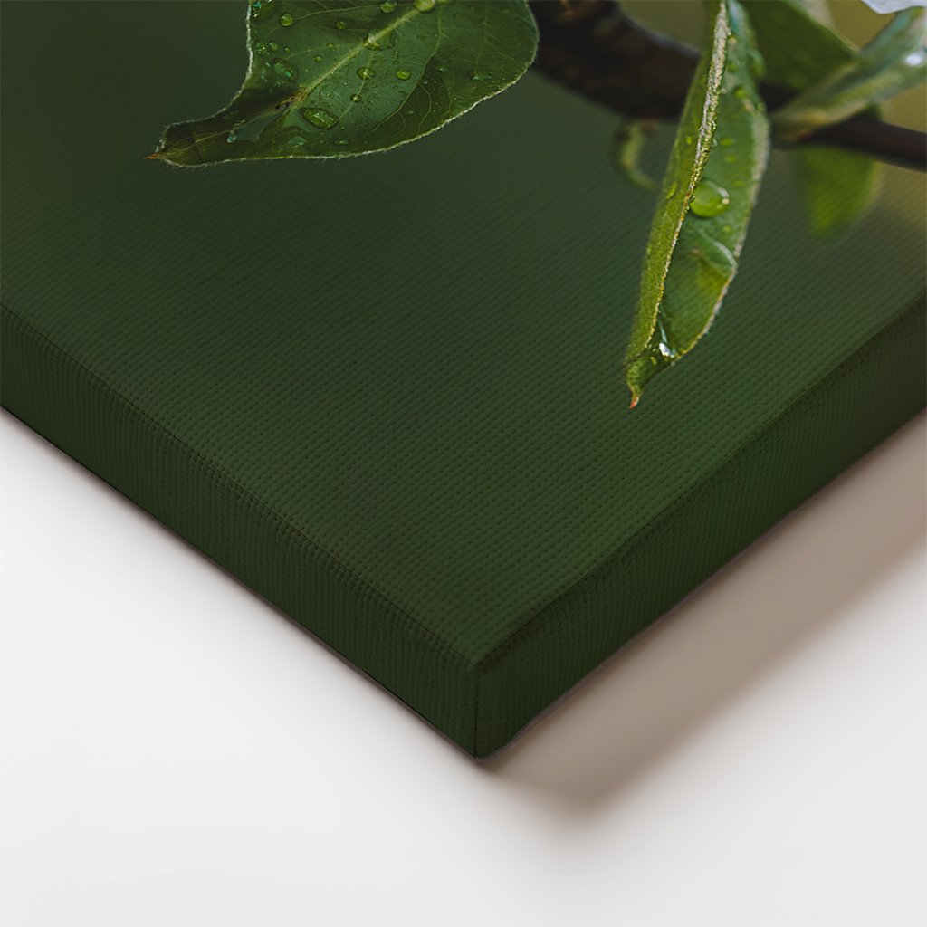 Close-up of canvas edge showing pear blossom details with soft gradients and natural tones.