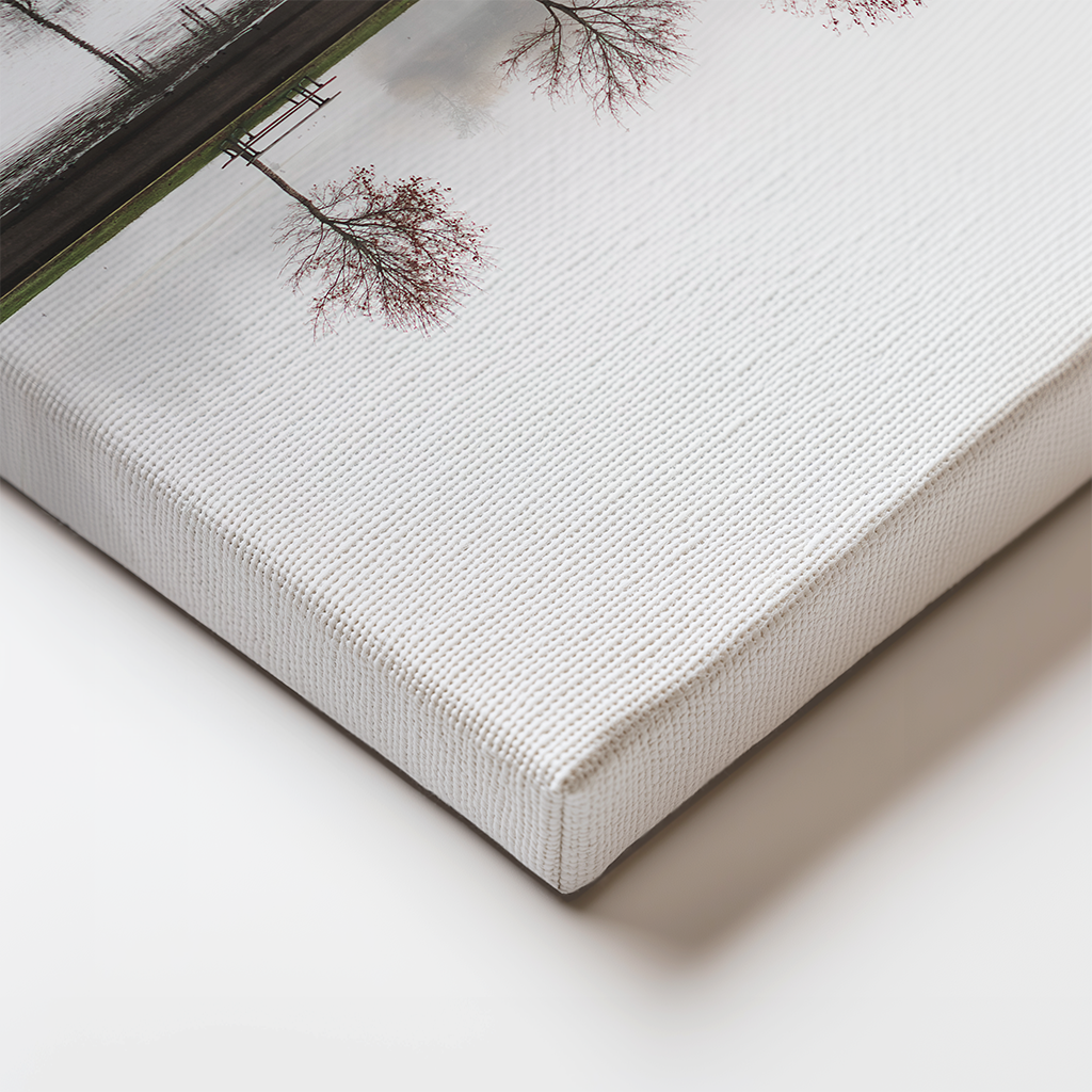 Close-up of canvas edge showing “Selmac” with tree reflections and subtle fog. Minimalist lake scene with rich detail and mood.