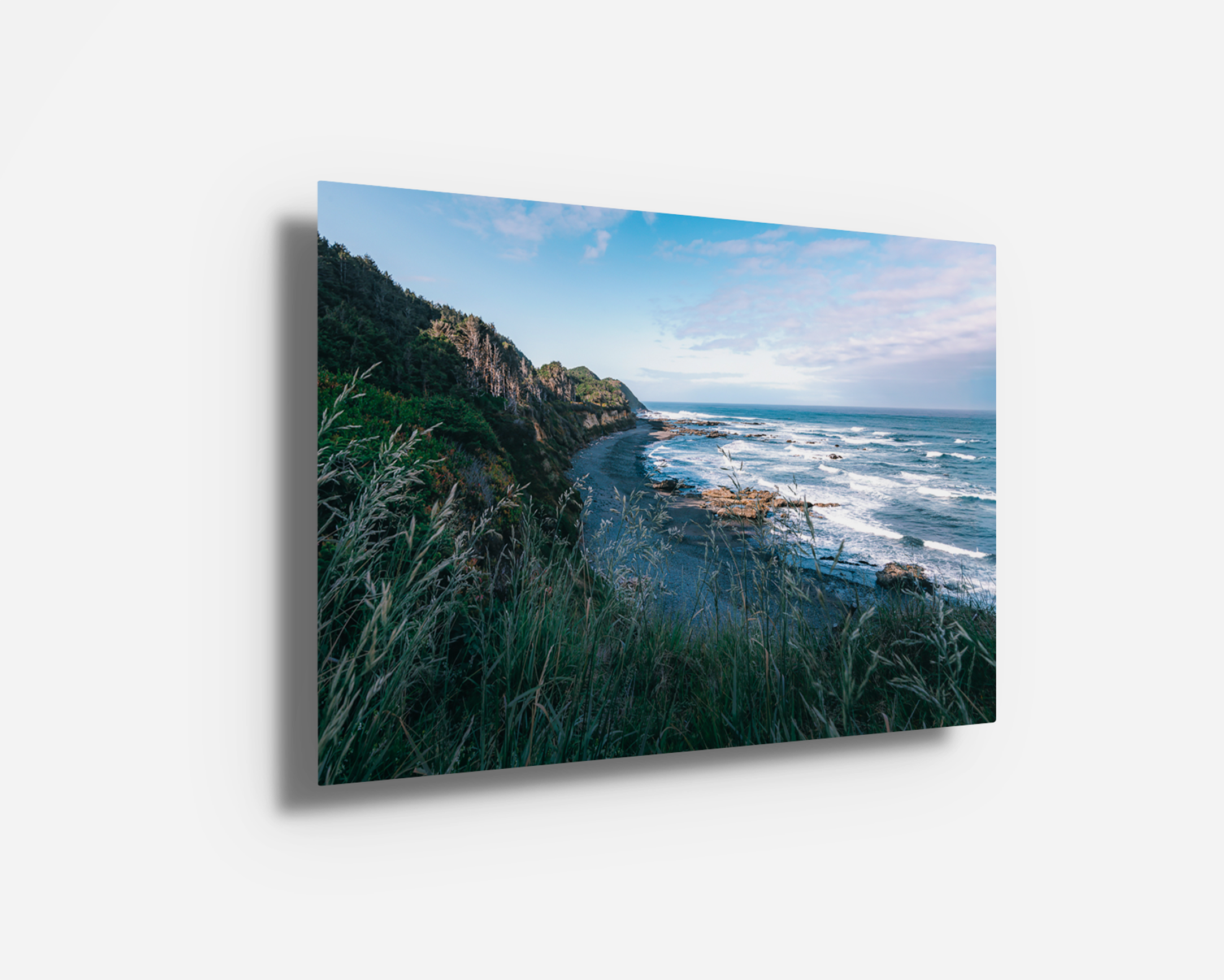 Vivid metal print of the Oregon Coast with shimmering ocean tones and steep cliffside captured at Strawberry Hill.