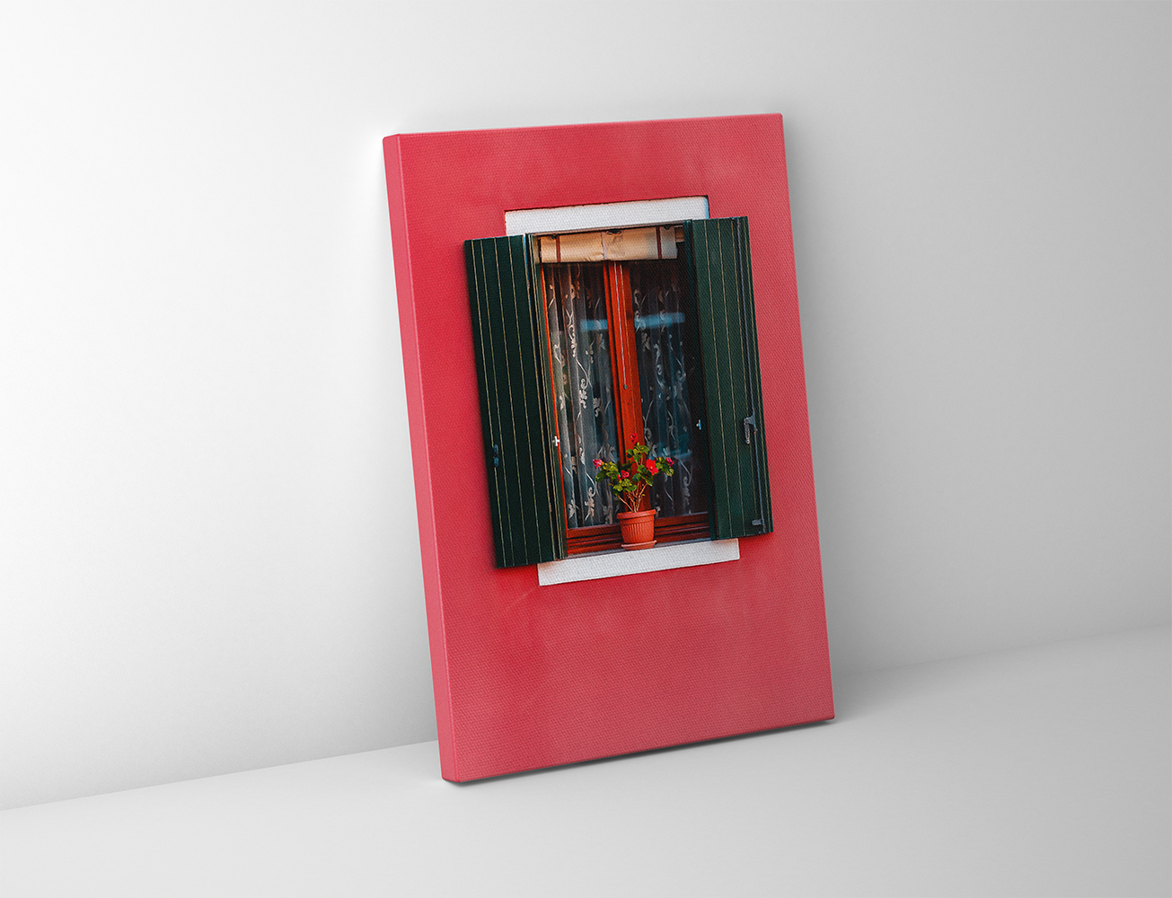 Gallery-wrapped canvas showing colorful Venetian architecture with open green shutters and floral detail.