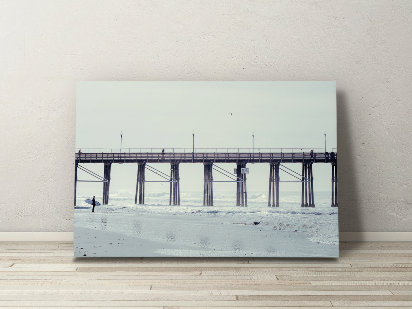 Gallery-wrapped canvas of a minimalistic seascape with a solitary surfer and expansive Oceanside pier in coastal mist.