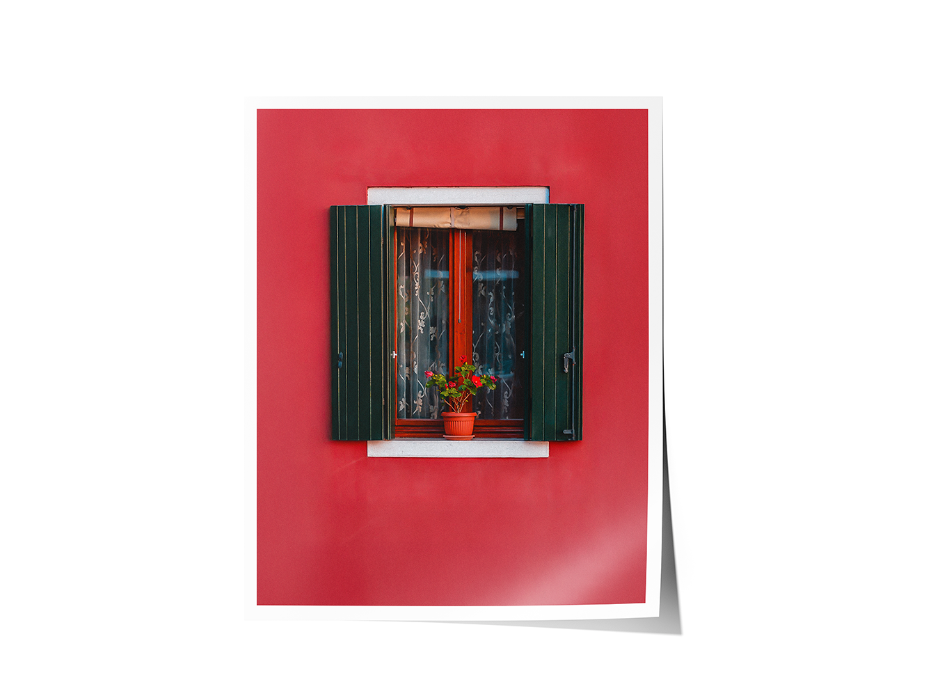 Fine art print of a classic Venetian window framed by a vivid red facade and flower-filled sill.