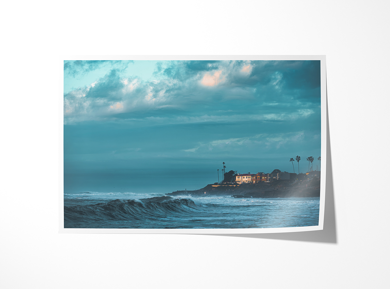 Archival art print of dramatic clouds and churning ocean waves off the California coast.