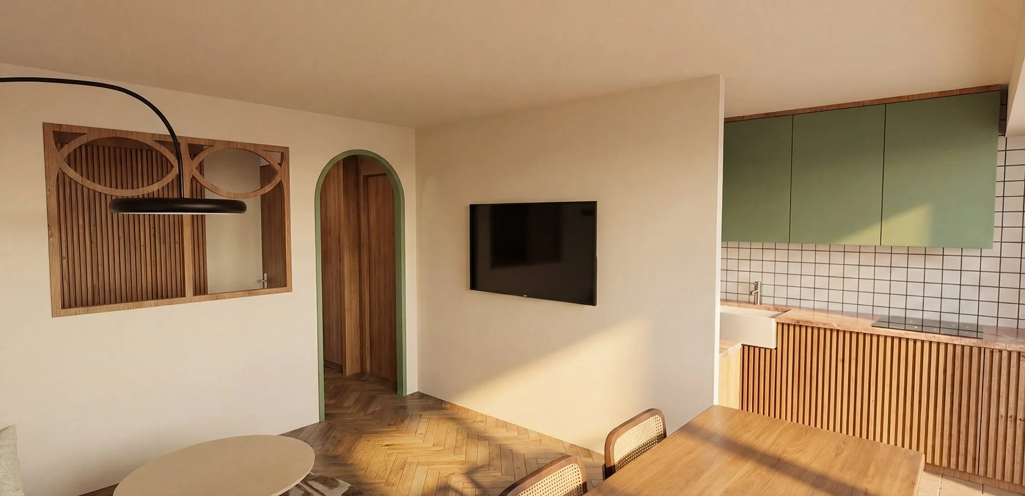 Vue globale du salon, la porte en arche donnant vers la chambre, l'entrée et la salle d'eau.