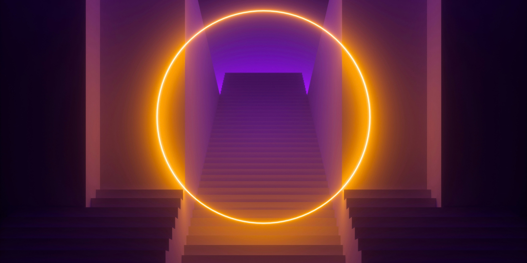 A digital artwork of a pinkish planet with a ring of asteroids in space, with a purple nebula and starry background.