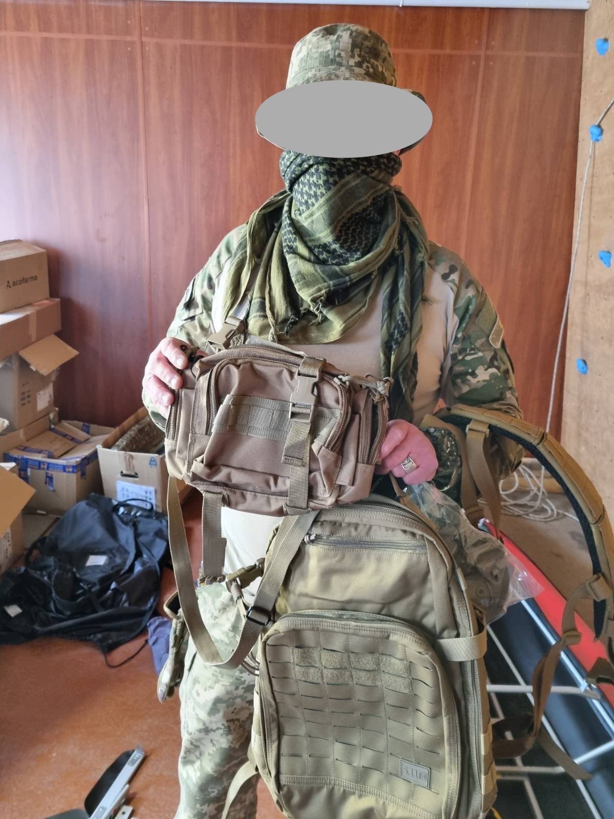 Soldier receives tactical pack from supplies we purchased in Poland