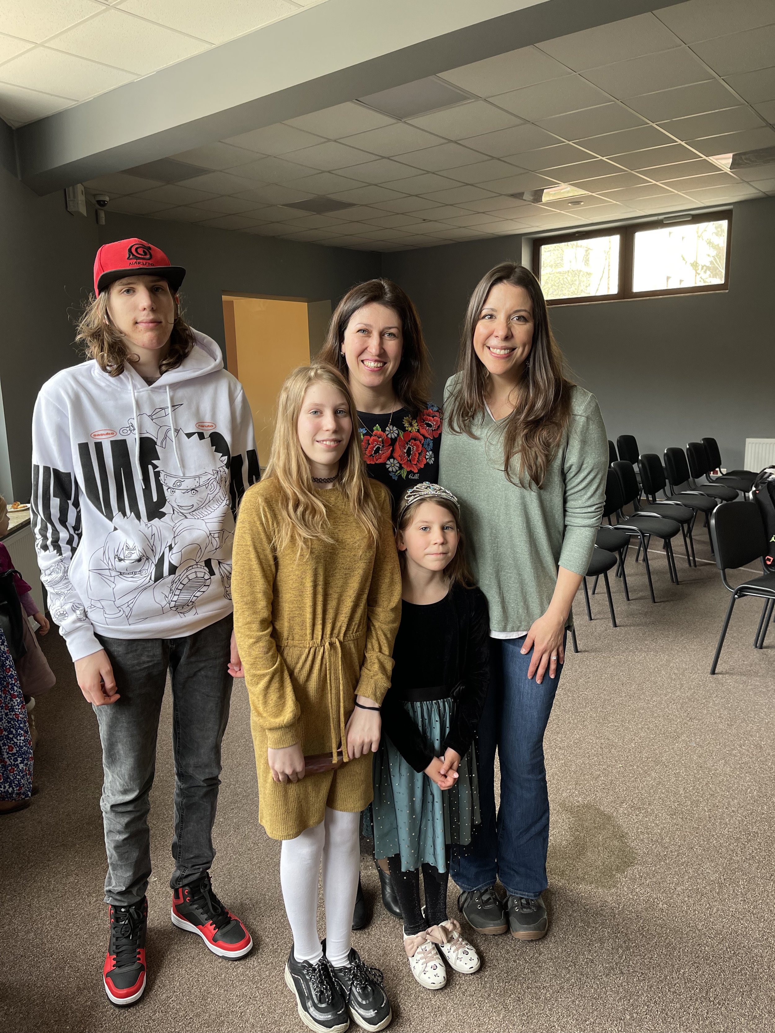 Easter 2022 - Lauren with Ukrainian Mother of 3, Juliya, and children Denis, Tanya, and Anya. This family lived in a refugee shelter in Lublin, Poland supported by your donations.