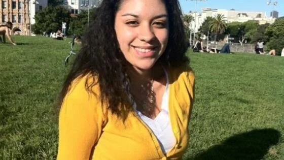 Bianca Gonzalez smiling in a field.
