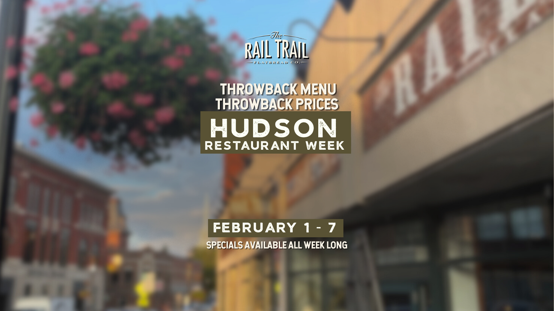 Blurred street view with a hanging flower basket and store signage, promotional text overlay about Hudson Restaurant Week February 1-7 with special prices.