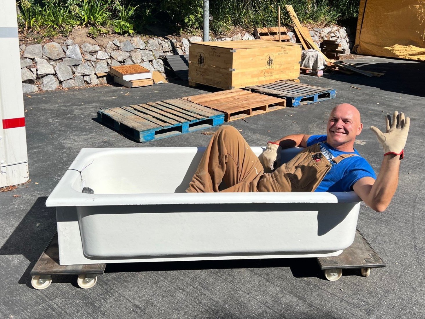 1919 cast iron bath tub remade into an outdoor spa area with a Shou Sugi Ban or Japanese Wood Burning and redwood surround