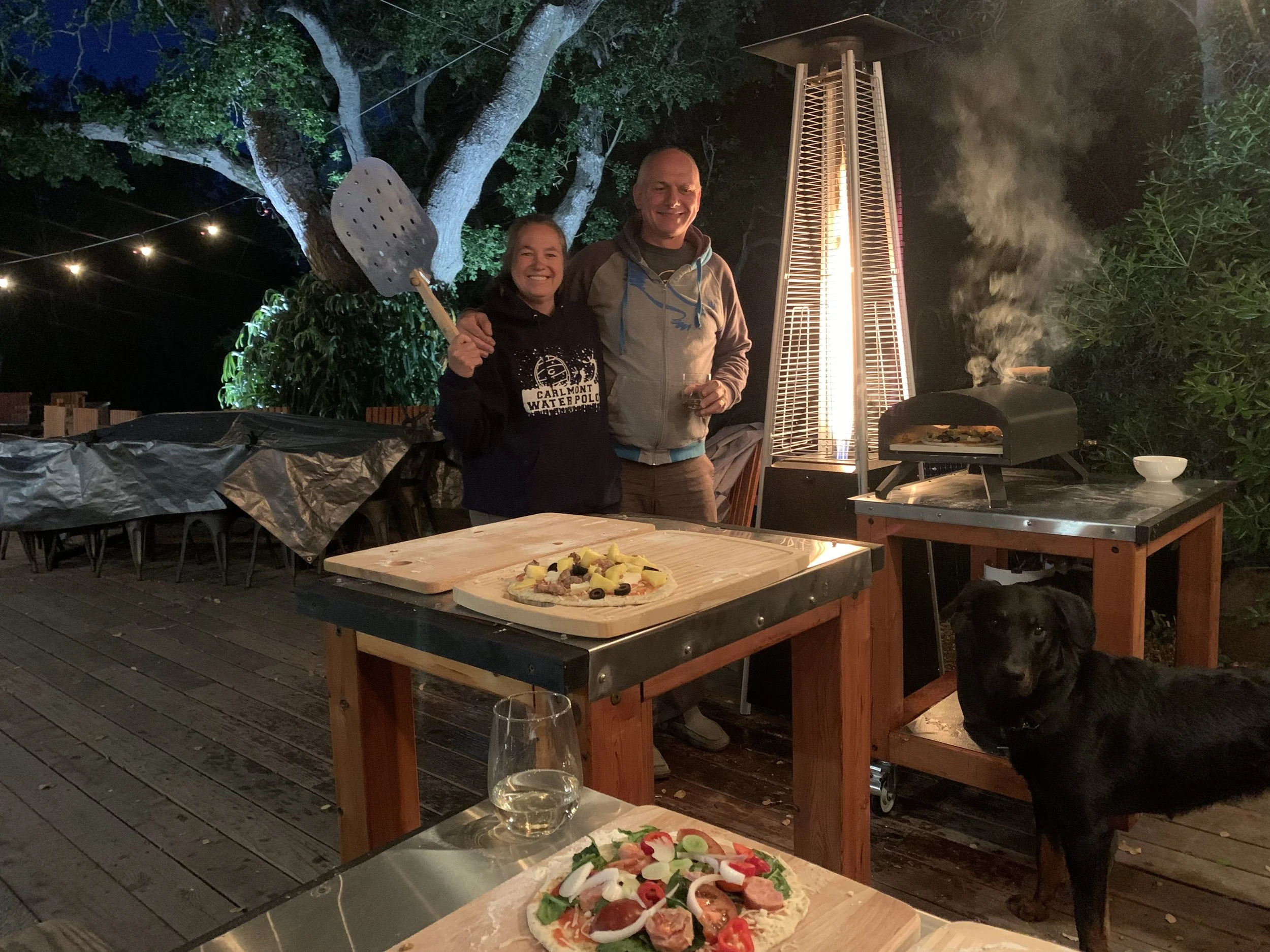 Redwood and stainless different sized countertops on wheels for outdoor kitchen