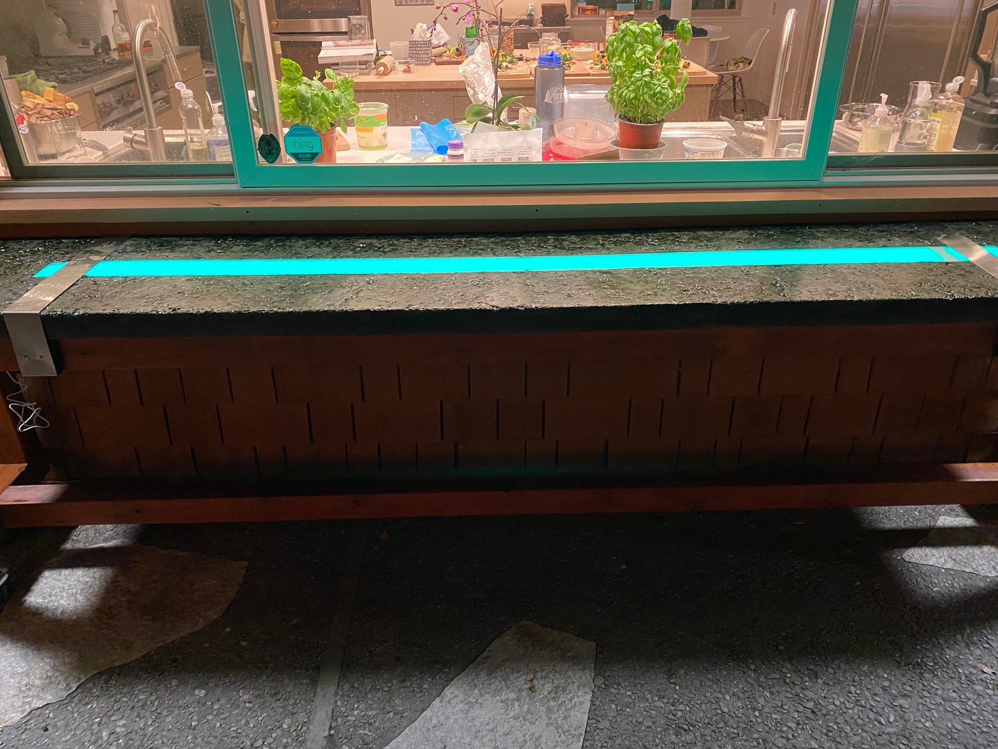 Pellegrino Glass Countertop Finished mounted on heavy duty rollers and redwood to move away from house for better access during parties