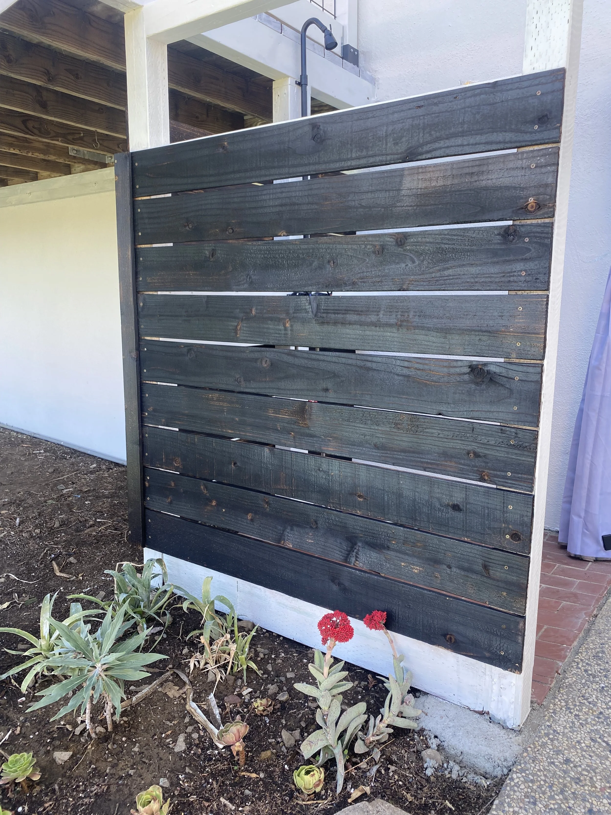 Shou Sugi Ban inspired outdoor shower surround