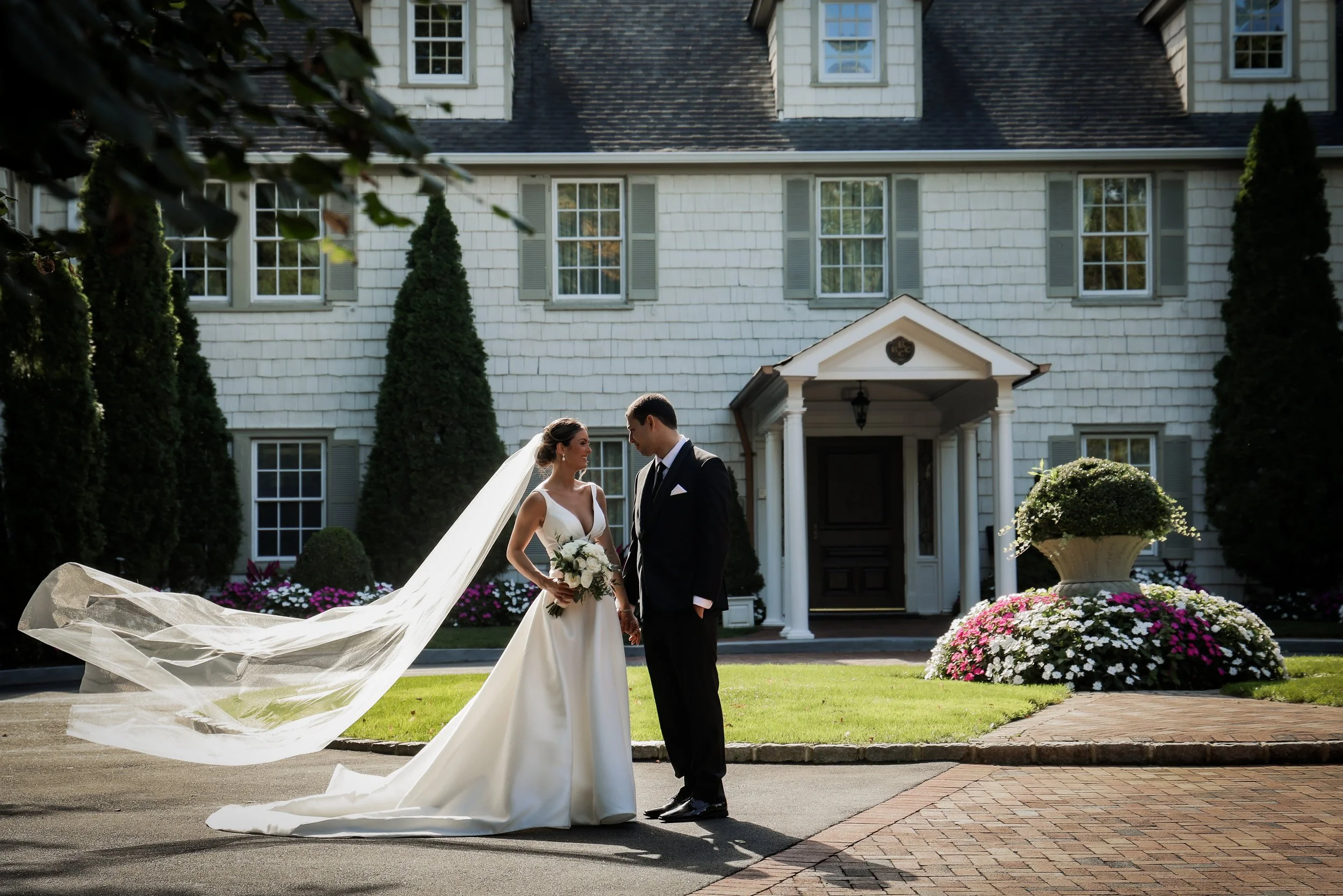 Couple in front of Royalton Mansion in Roslyn