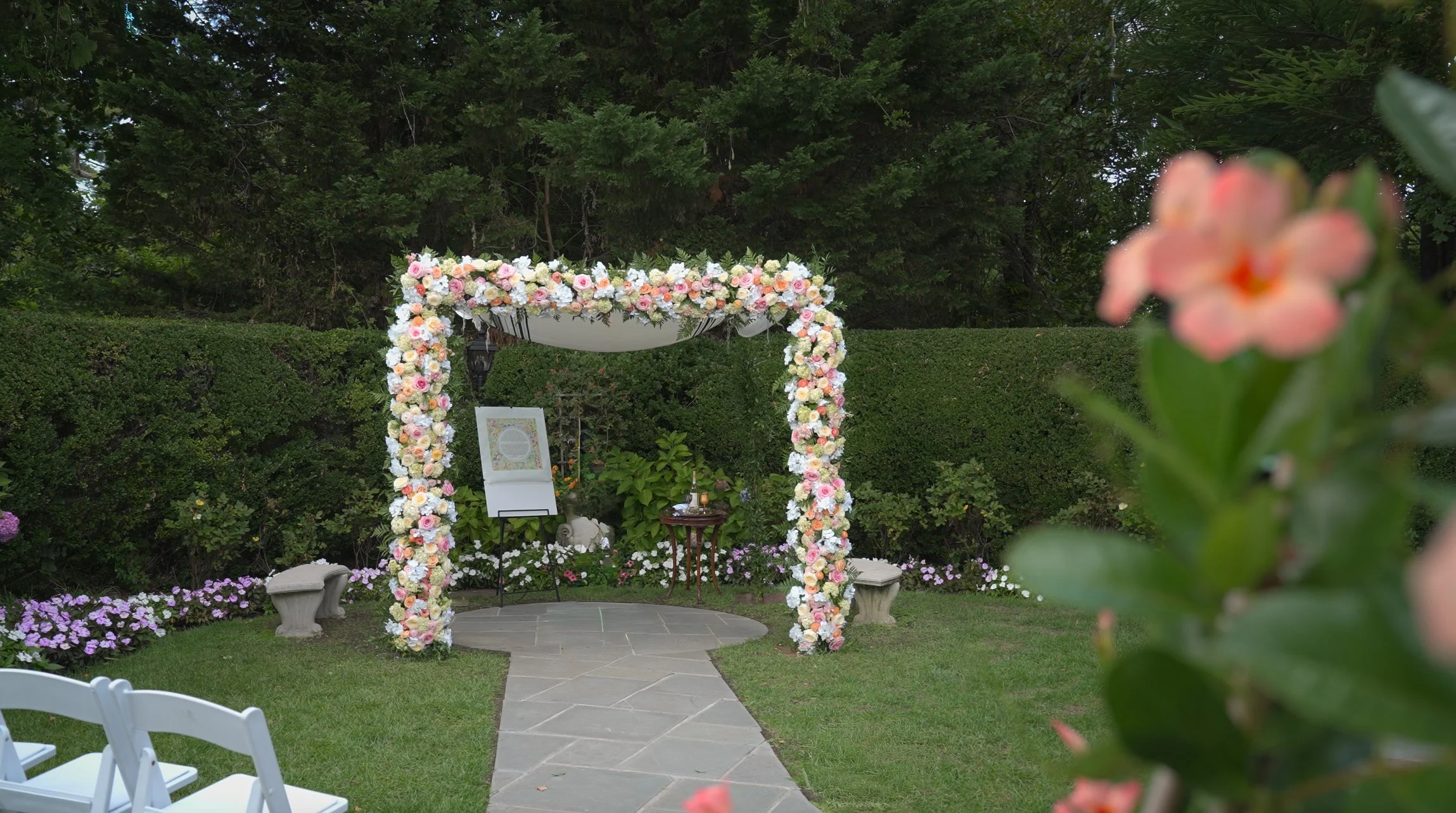The outdoor ceremony space in the garden at Royalton Mansion