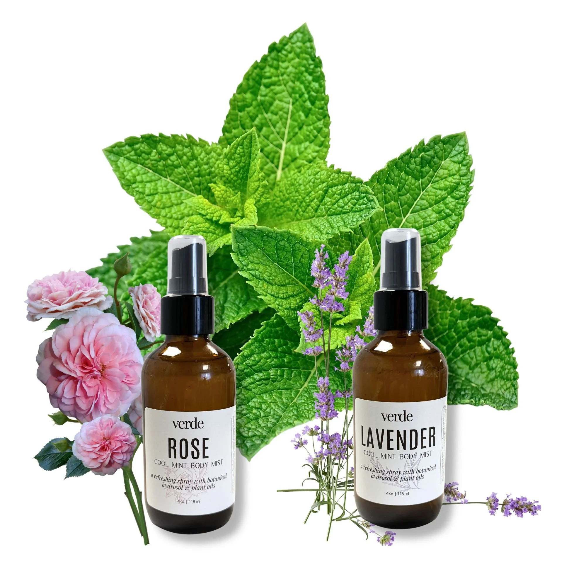 bottles of apothecary verde rose and lavender cool mint body mist sitting in front of a background with pink roses, lavender stems, and a large sprig of bright green peppermint