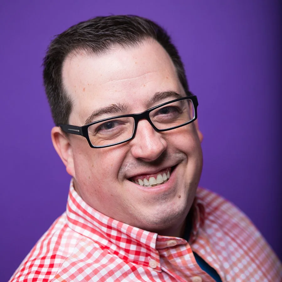 Smiling man with glasses