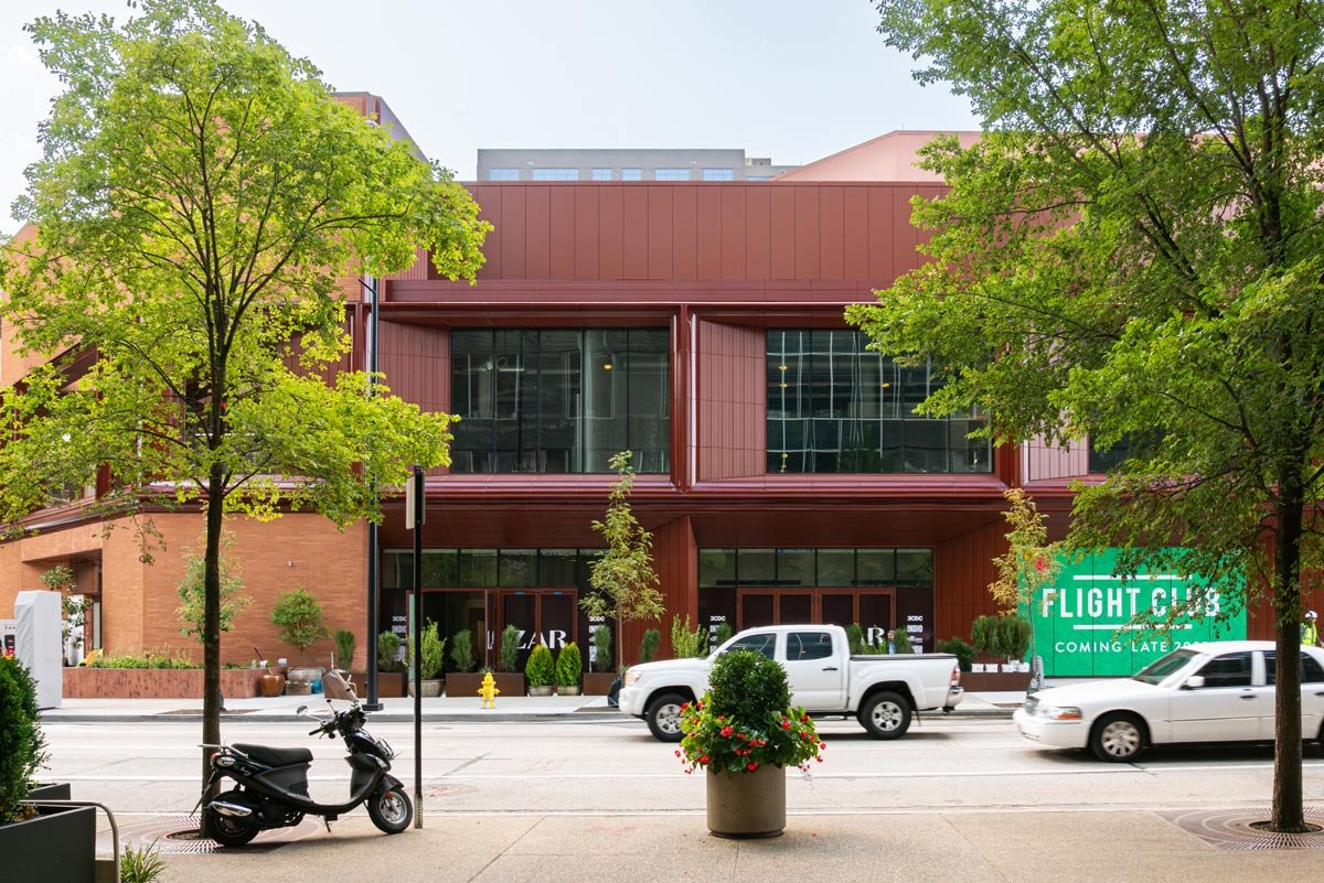 Street-level view of the Paycor HQ redevelopment in Cincinnati showing the large-format TONALITY terracotta façade, engineered exoFRAMING system, and custom color panels.