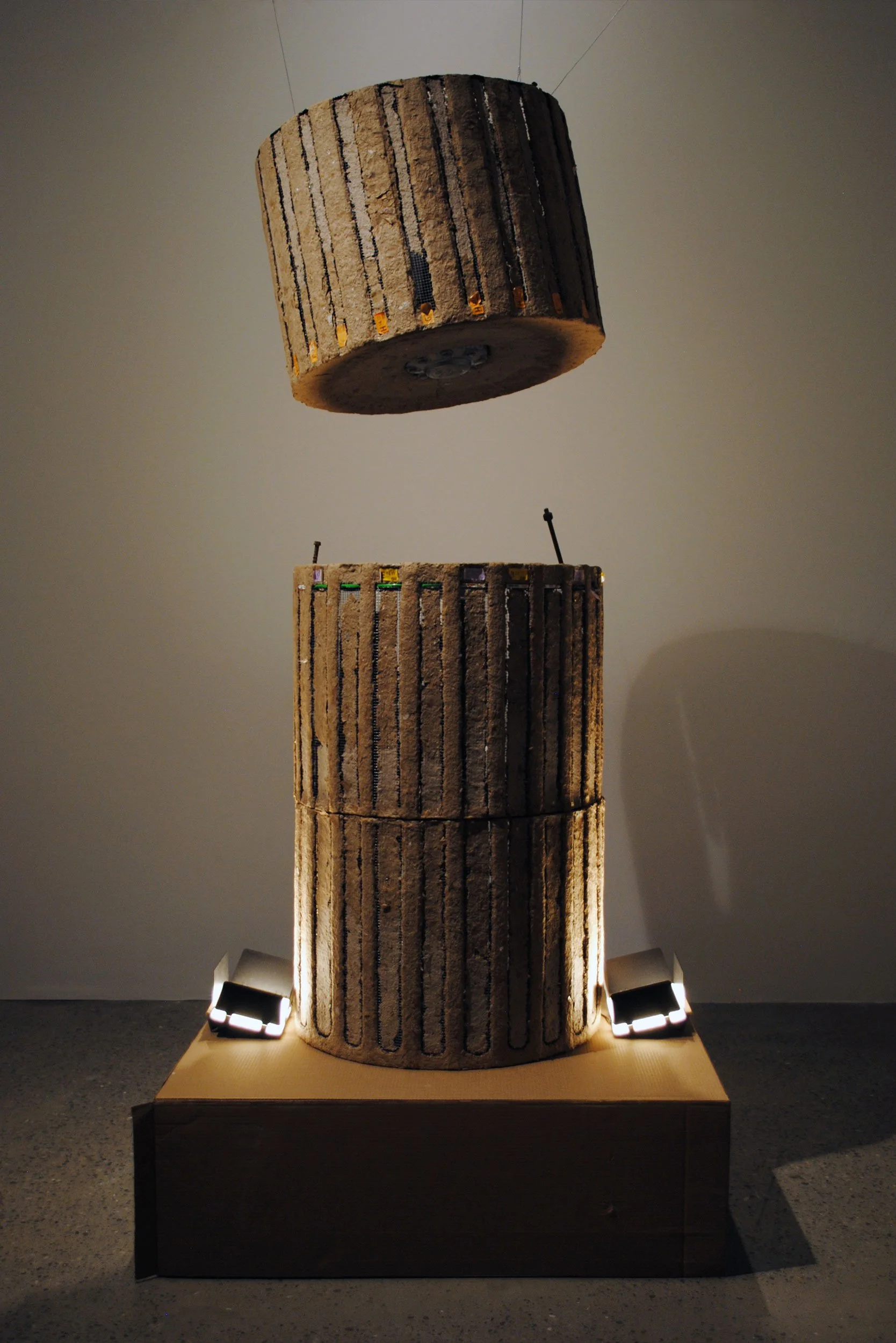 𝙎𝙡𝙤𝙬 𝙑𝙞𝙤𝙡𝙚𝙣𝙘𝙚 | 96x54 in. | Cardboard pulp, metal mesh, wheel cap, take-out container, silica gel bags, and miscellaneous waste.