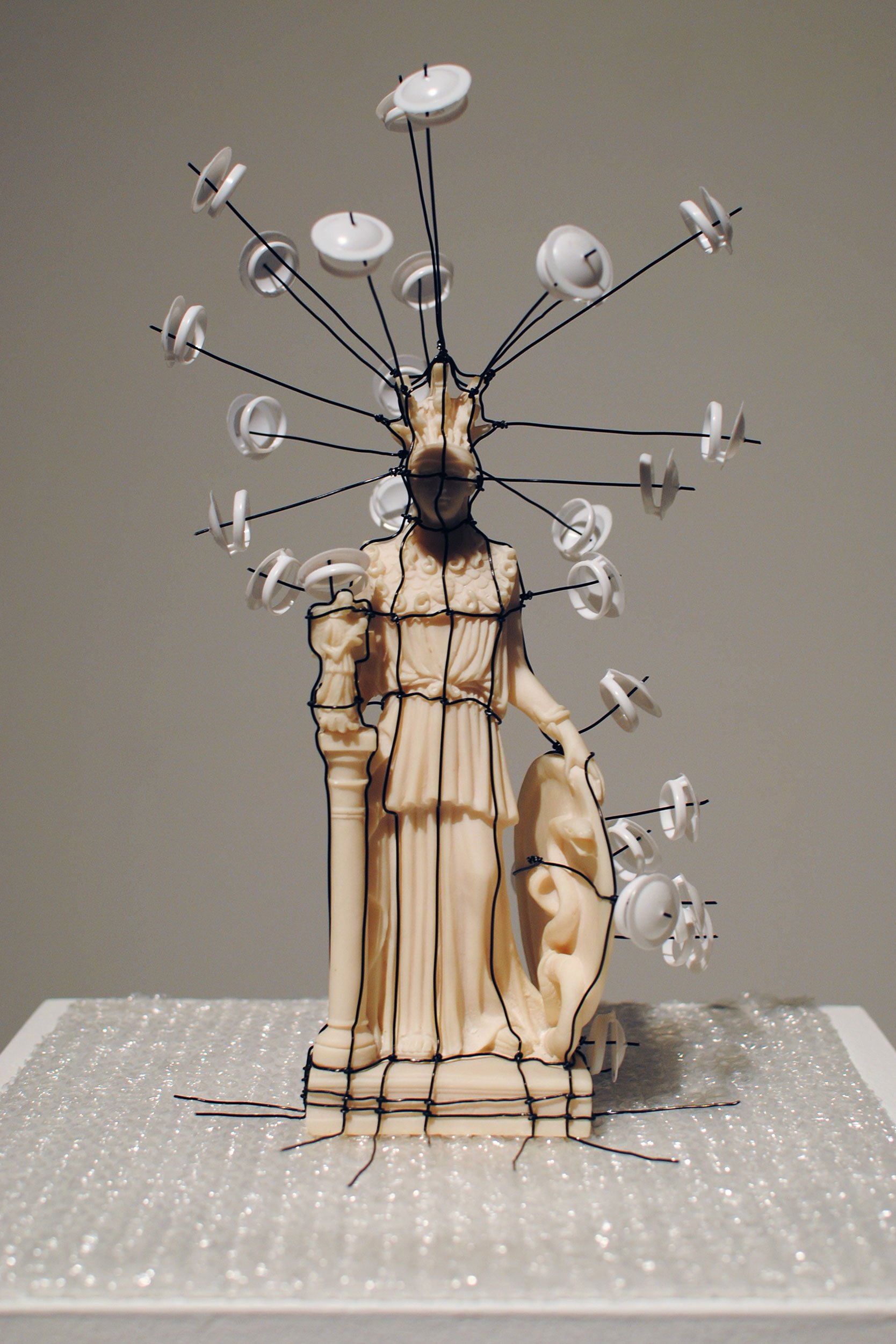 𝘼𝙩𝙝𝙚𝙣𝙖 𝙎𝙤𝙪𝙫𝙚𝙣𝙞𝙧 (2024) | 15$ flea market sculpture, plastic pull tabs, steel wire, bubble wrap.