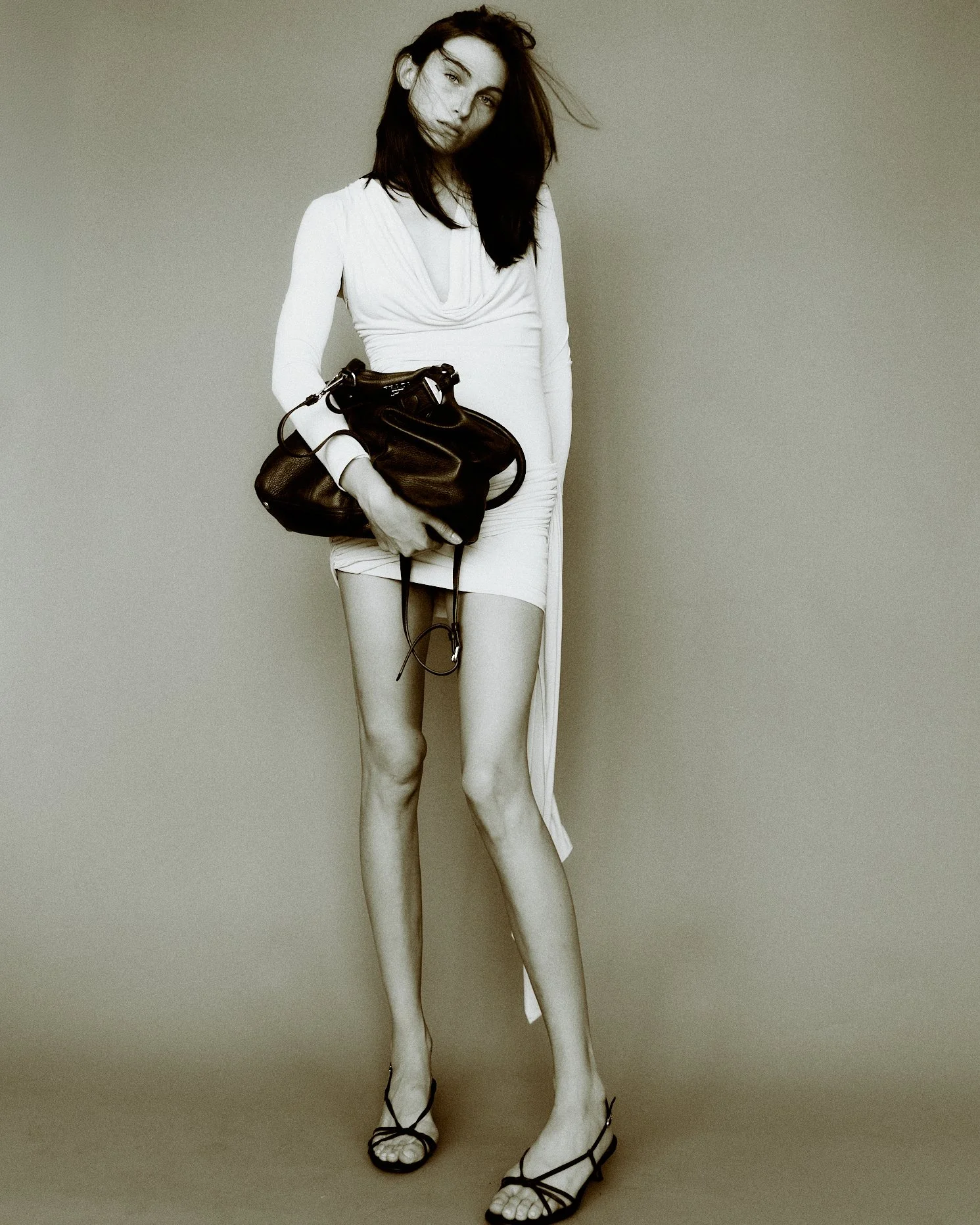 Olivia Peterson of Ford Models photographed by NYC fashion female photographer Yu Mengci, wearing Prada and YSL, ZARA, Sam Edelman,in a fashion editorial.