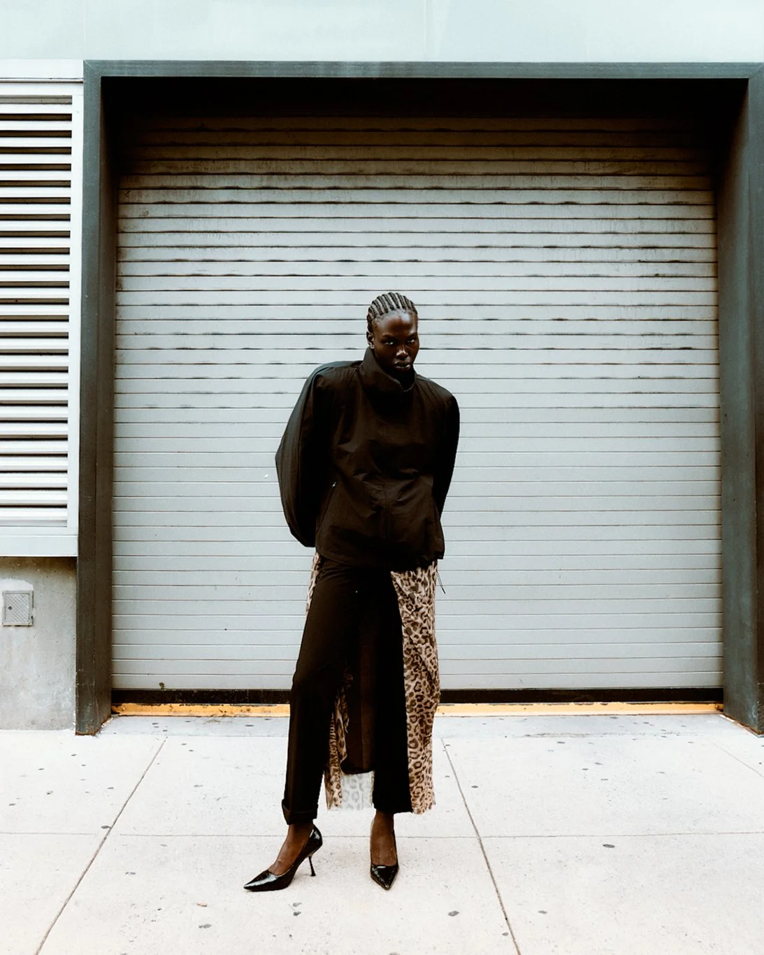 Abok Yor of One Management photographed by Yu Mengci wearing a Zara shirt and Michael Kors shoes