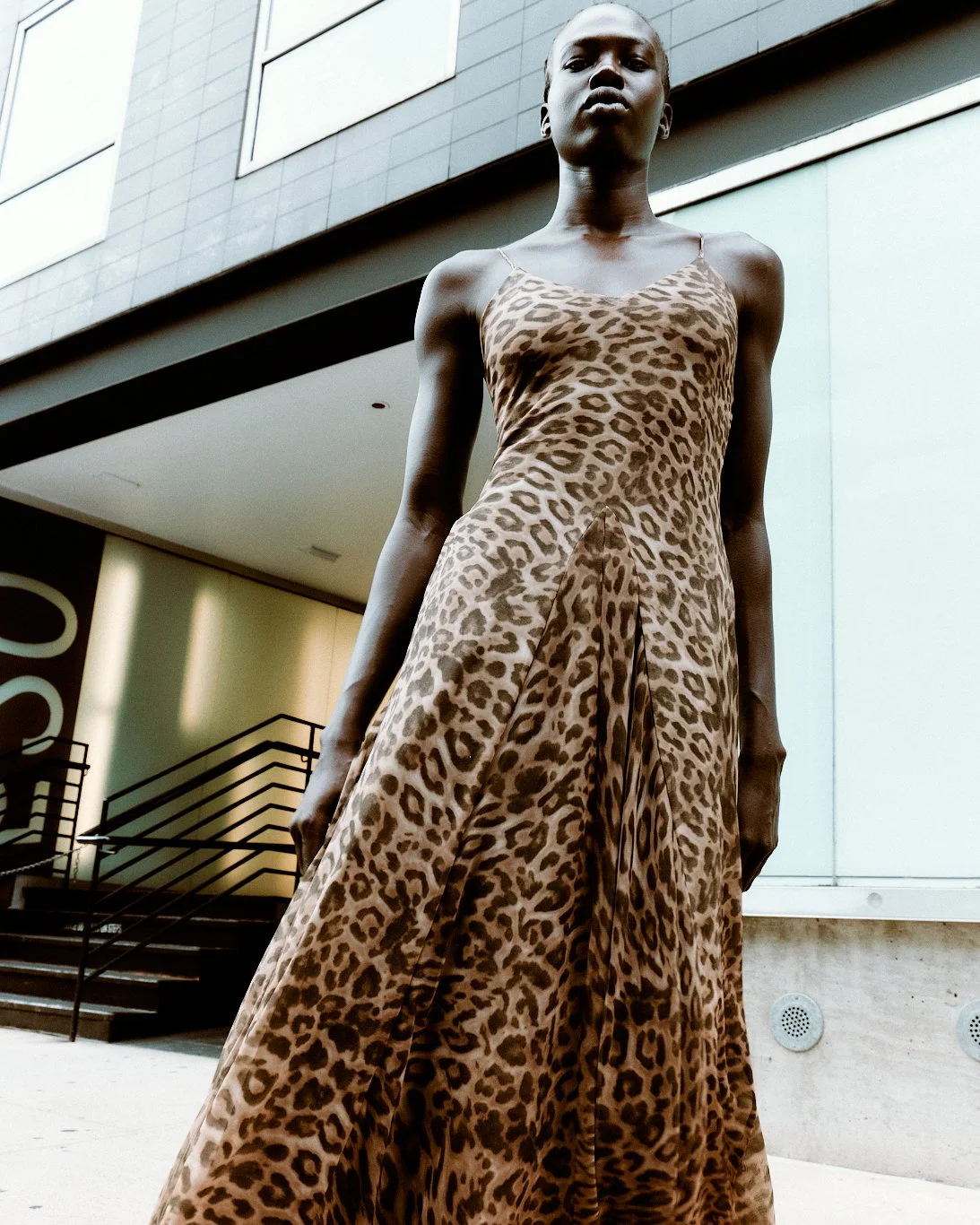 Abok Yor of One Management photographed by Yu Mengci wearing a Zara shirt and Michael Kors shoes