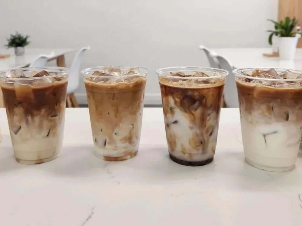 4 iced flavored lattes on the counter, some of the best coffee orders to try