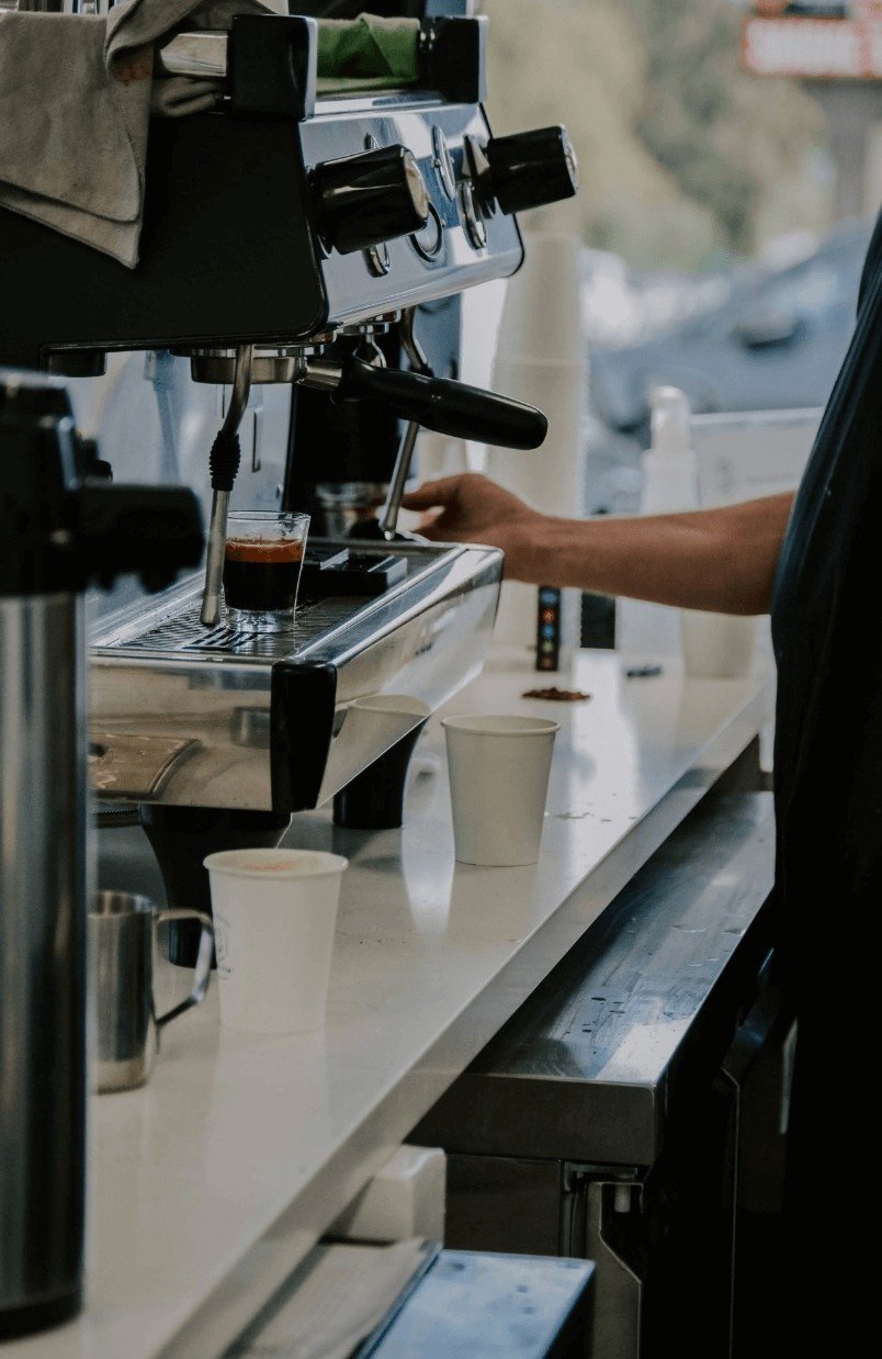 barista making drinks at Inicio during opening week
